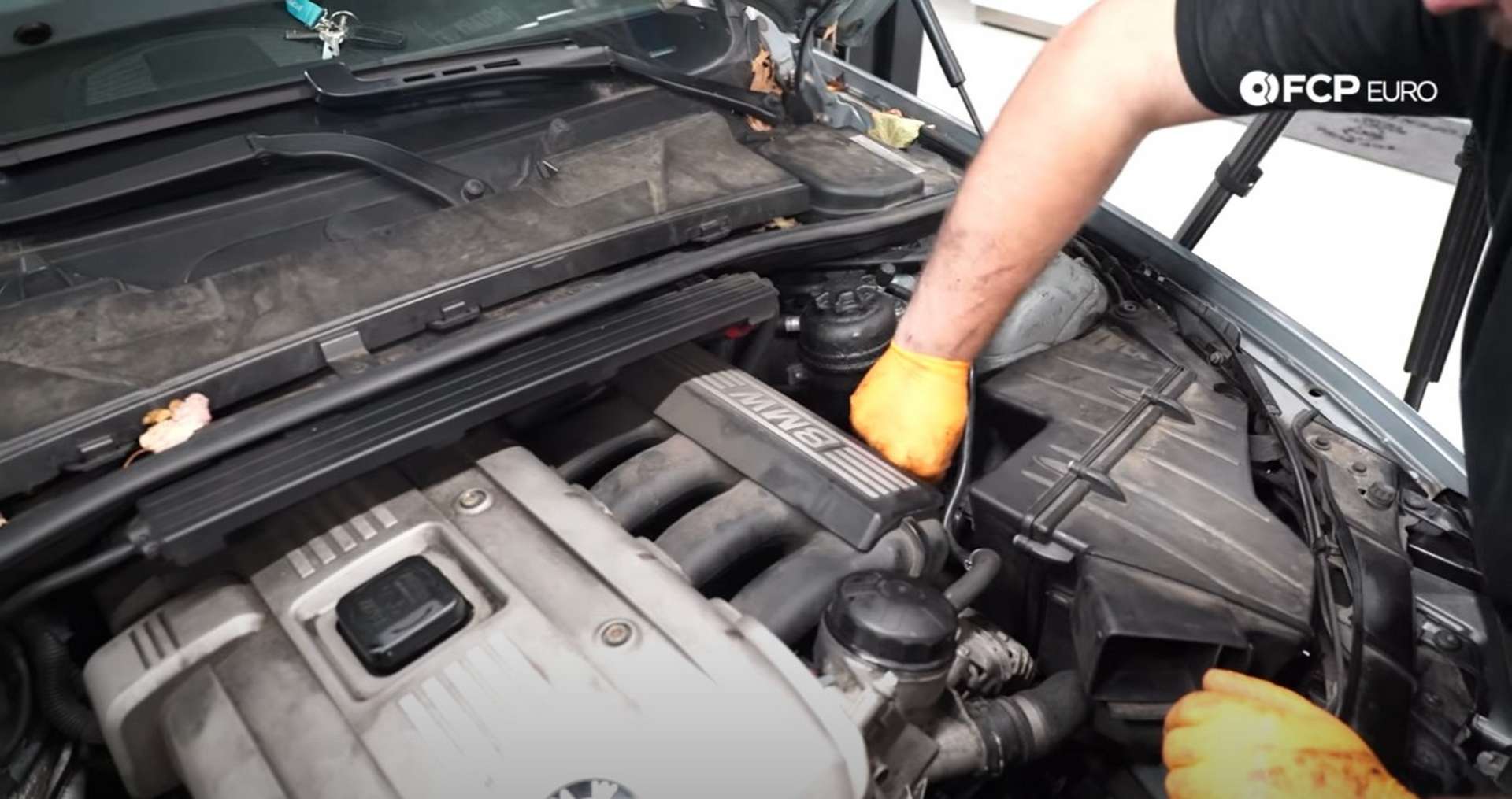 DIY BMW N52 Drive Belt Replacement reconnecting the mass airflow sensor