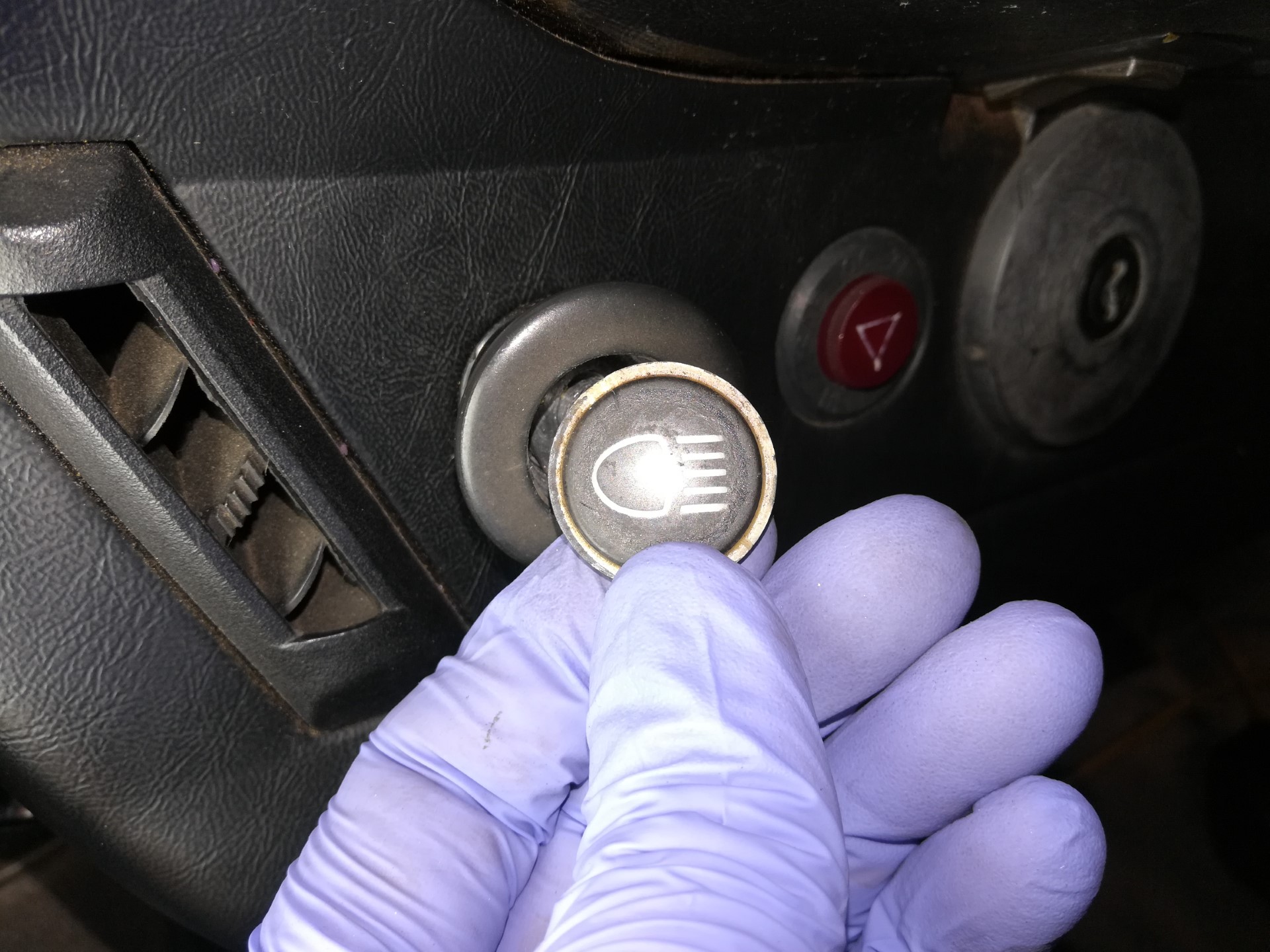Air-cooled Porsche 911 headlight switch removal.