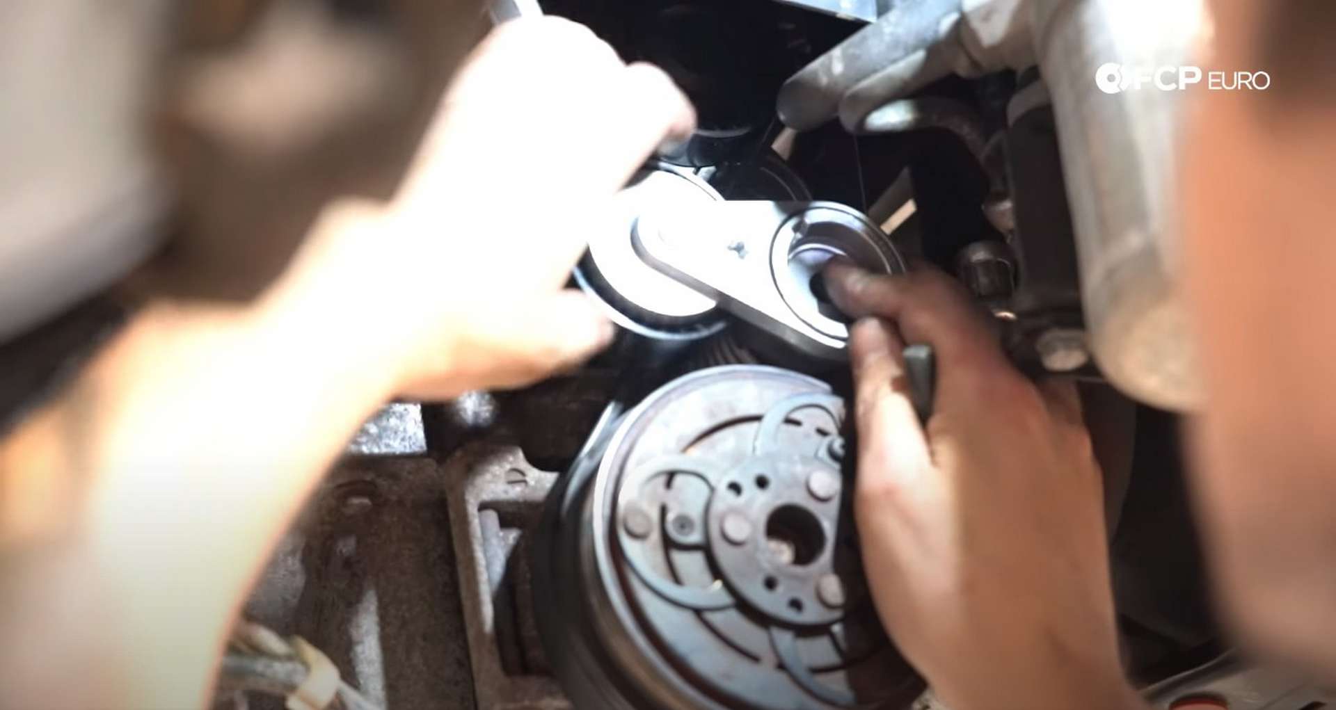 DIY Volvo Alternator and Serpentine Belt Replacement installing the outer tensioner