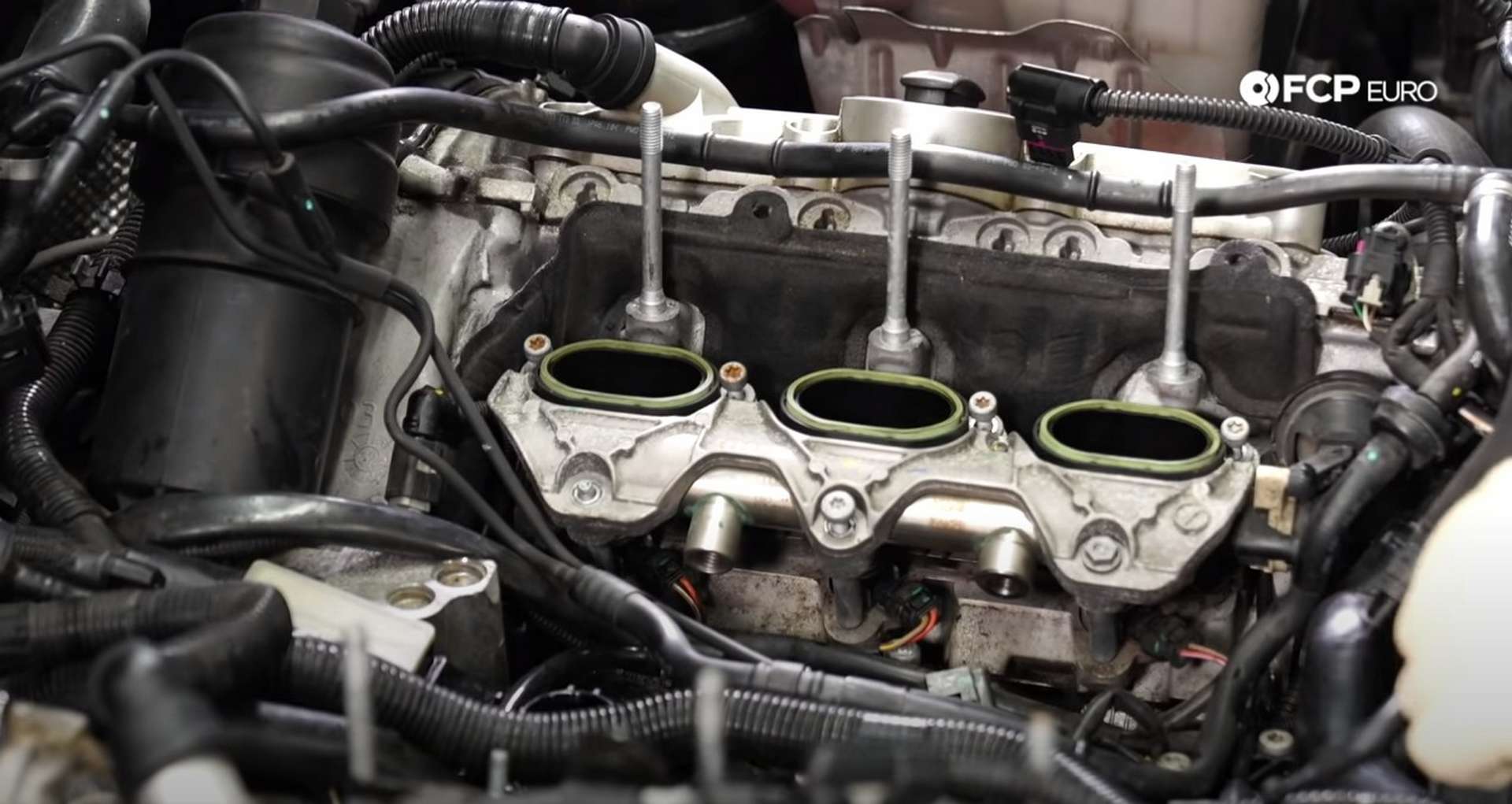 DIY Audi 3.0t Walnut Blasting Intake Valves installing the manifold/tumble flap housing