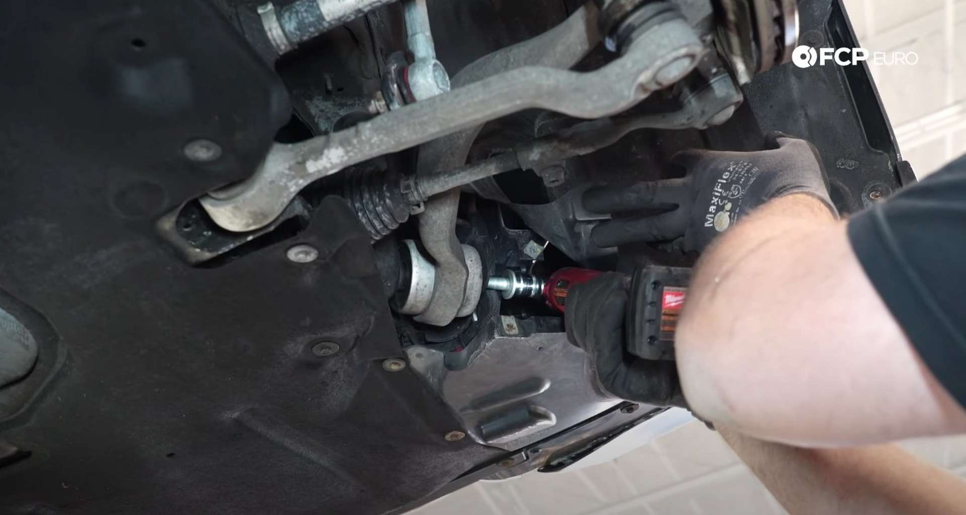 DIY BMW F30 Front Control Arm Replacement removing the thrust arm's mounting bolt