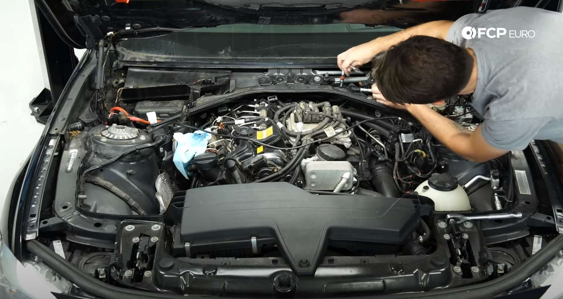 DIY BMW N20 Vacuum Pump removing the engine cover