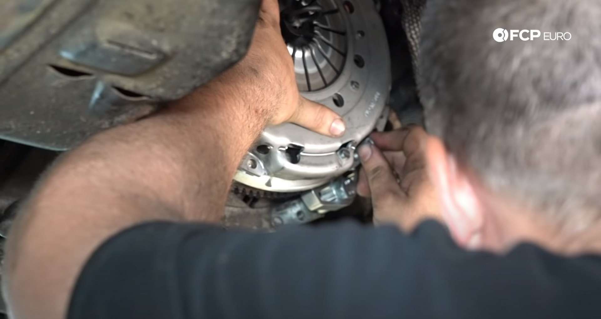 DIY BMW E46 Clutch Replacement installing the new pressure plate