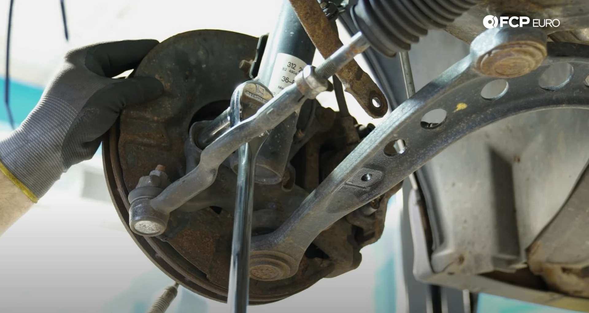 DIY BMW E36 Coilovers removing the lower strut bolts