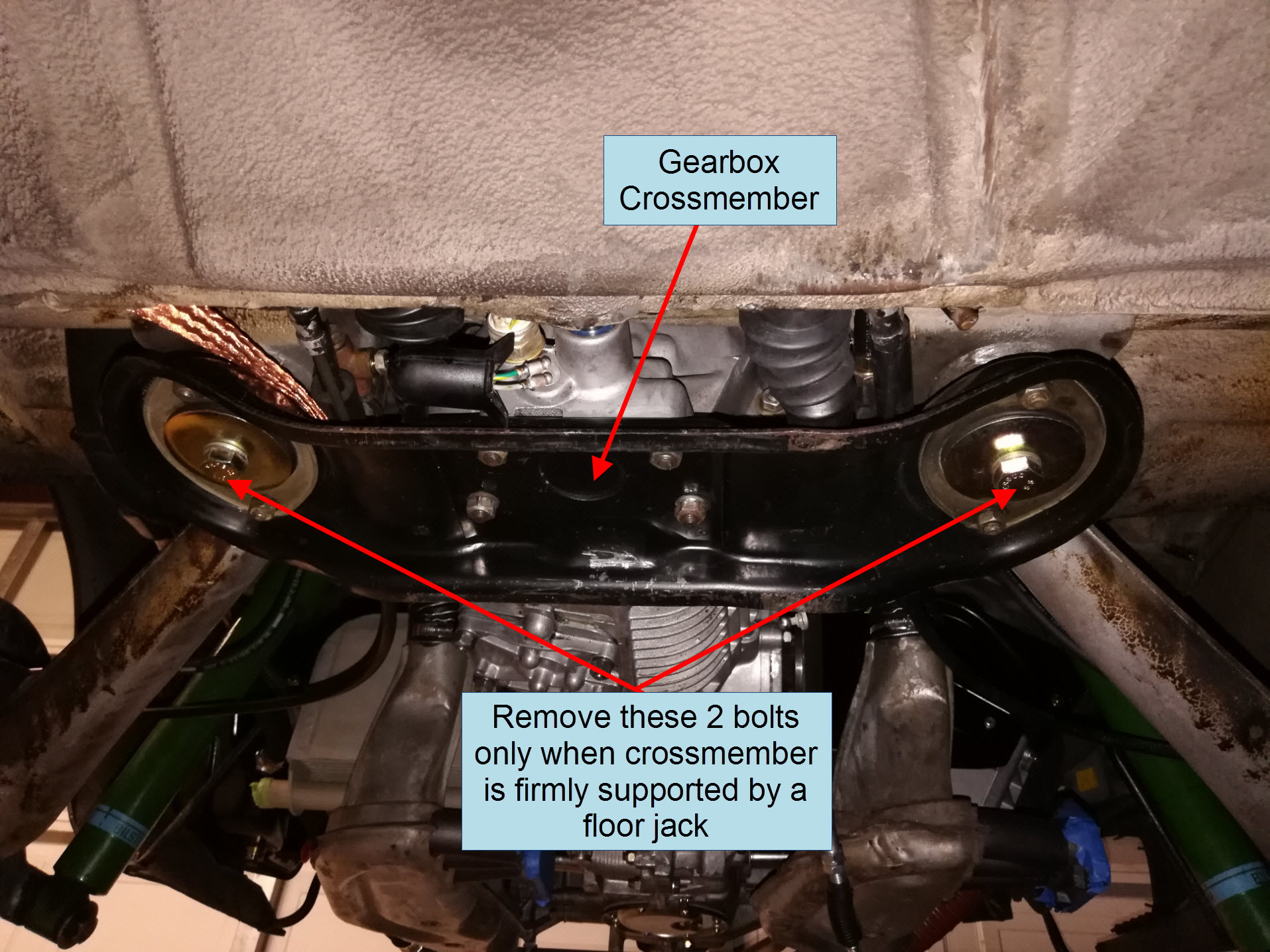 Air-cooled Porsche 911 gearbox crossmember and mounting bolts.