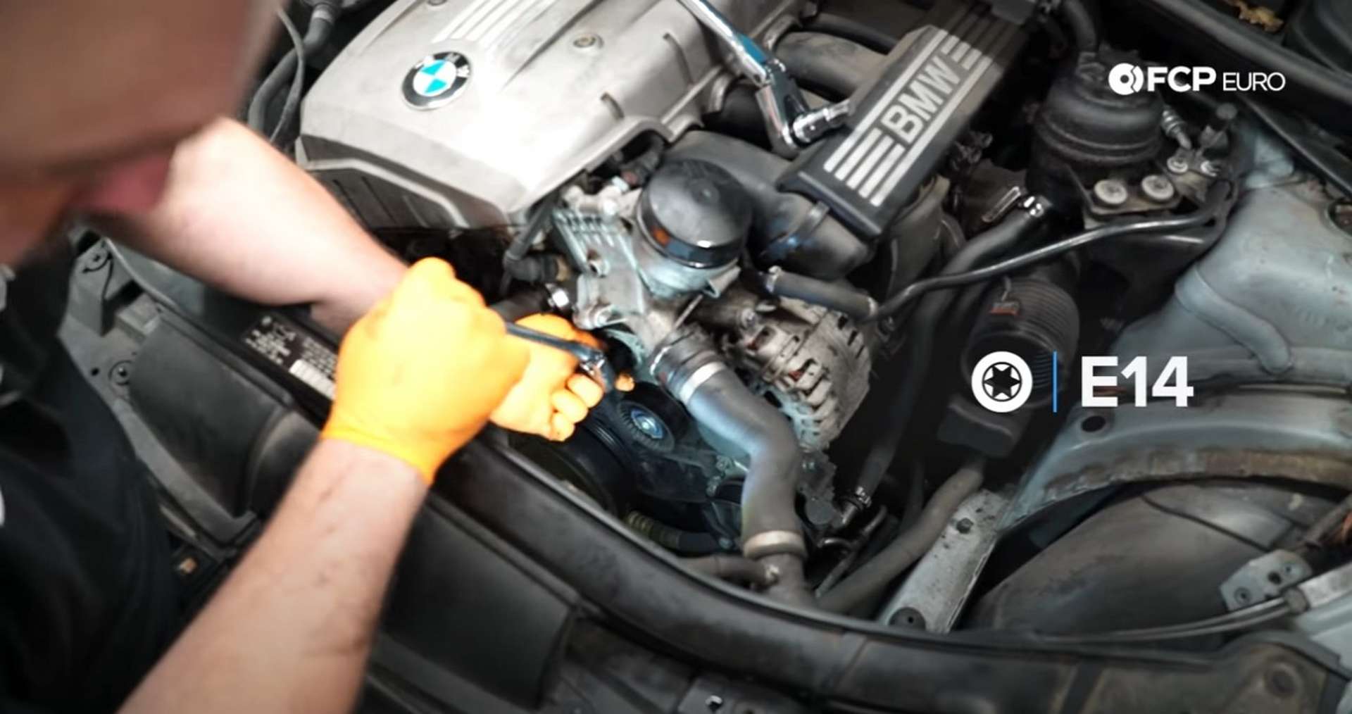 DIY BMW N52 Drive Belt Replacement removing the belt tensioner
