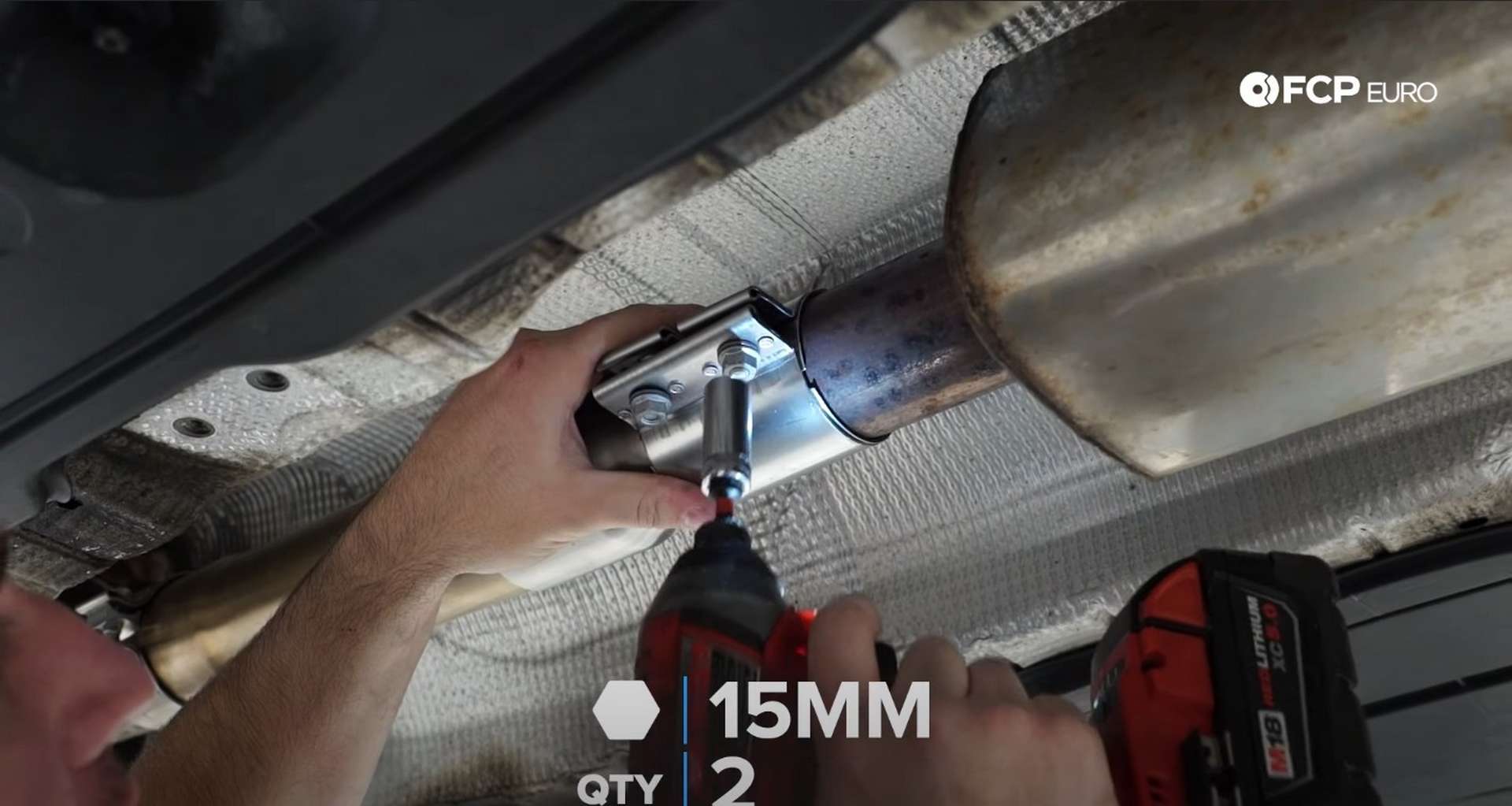 DIY MK7 VW GTI Turbocharger Upgrade securing the exhaust to the downpipe