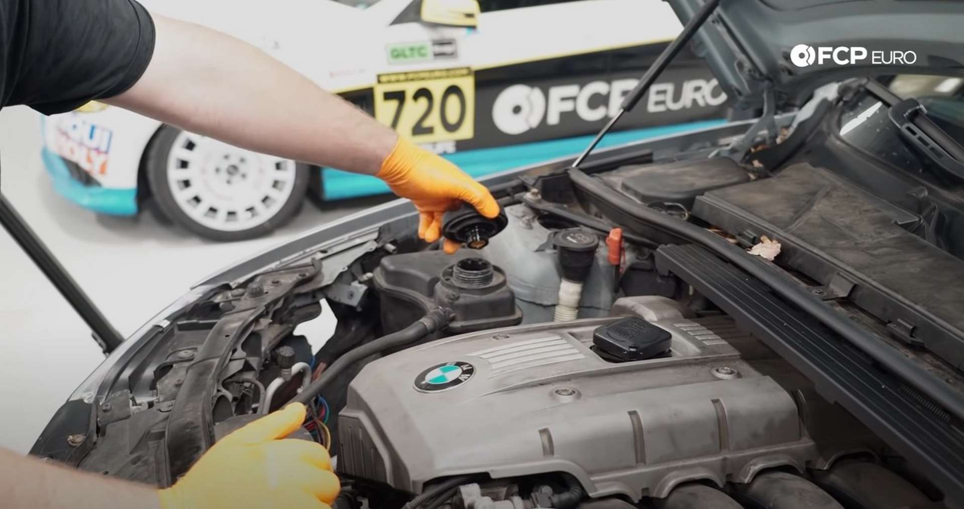 DIY BMW E9X Oil Filter Gasket Replacement removing the coolant expansion tank cap