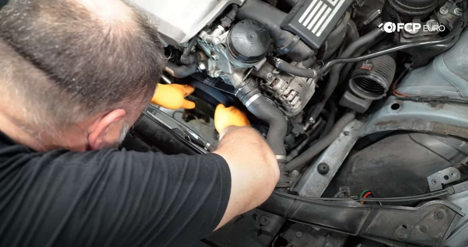DIY BMW N52 Drive Belt Replacement routing the belt