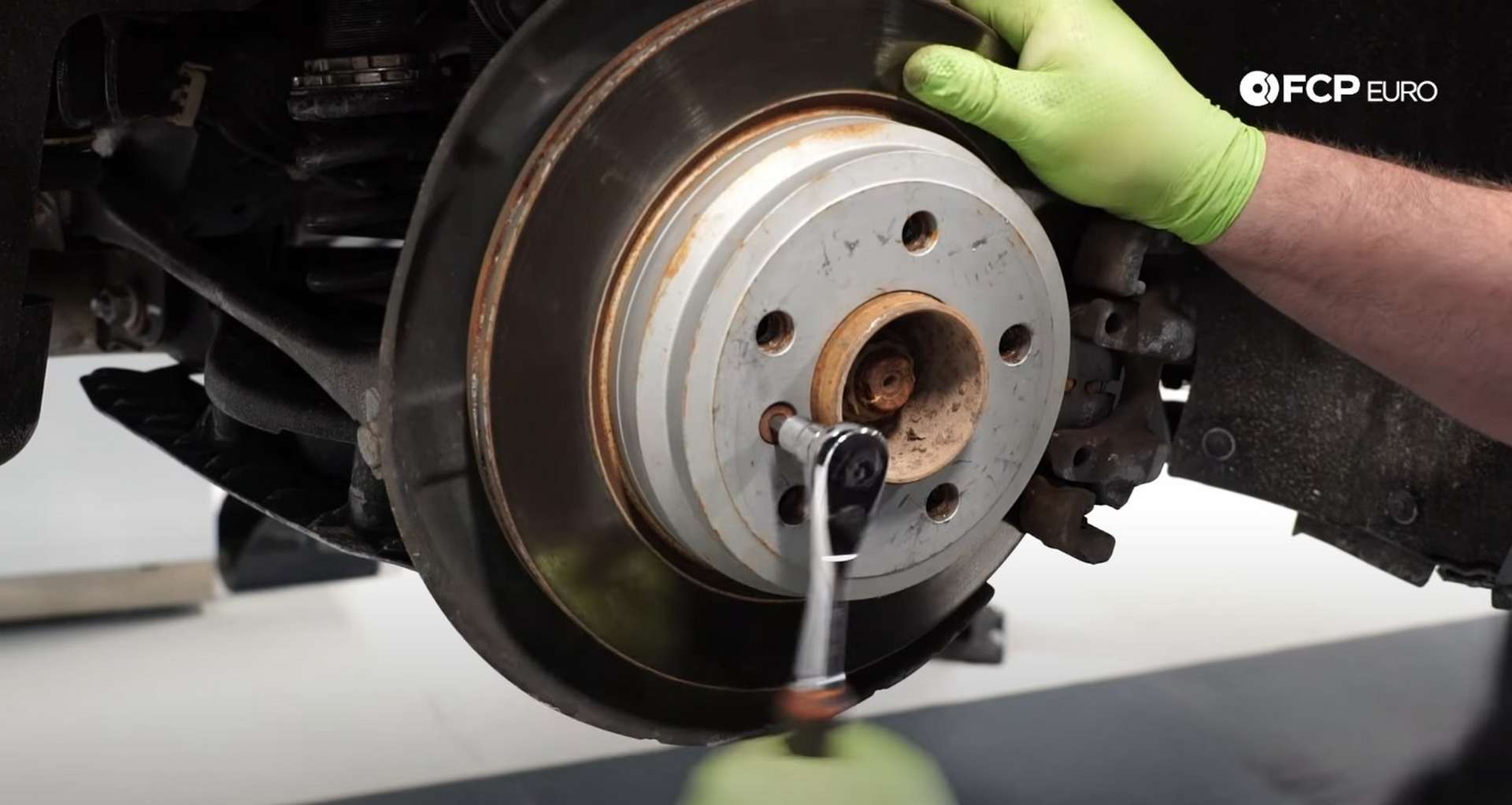 DIY BMW F30 Rear Brake Service removing the rotor's set screw