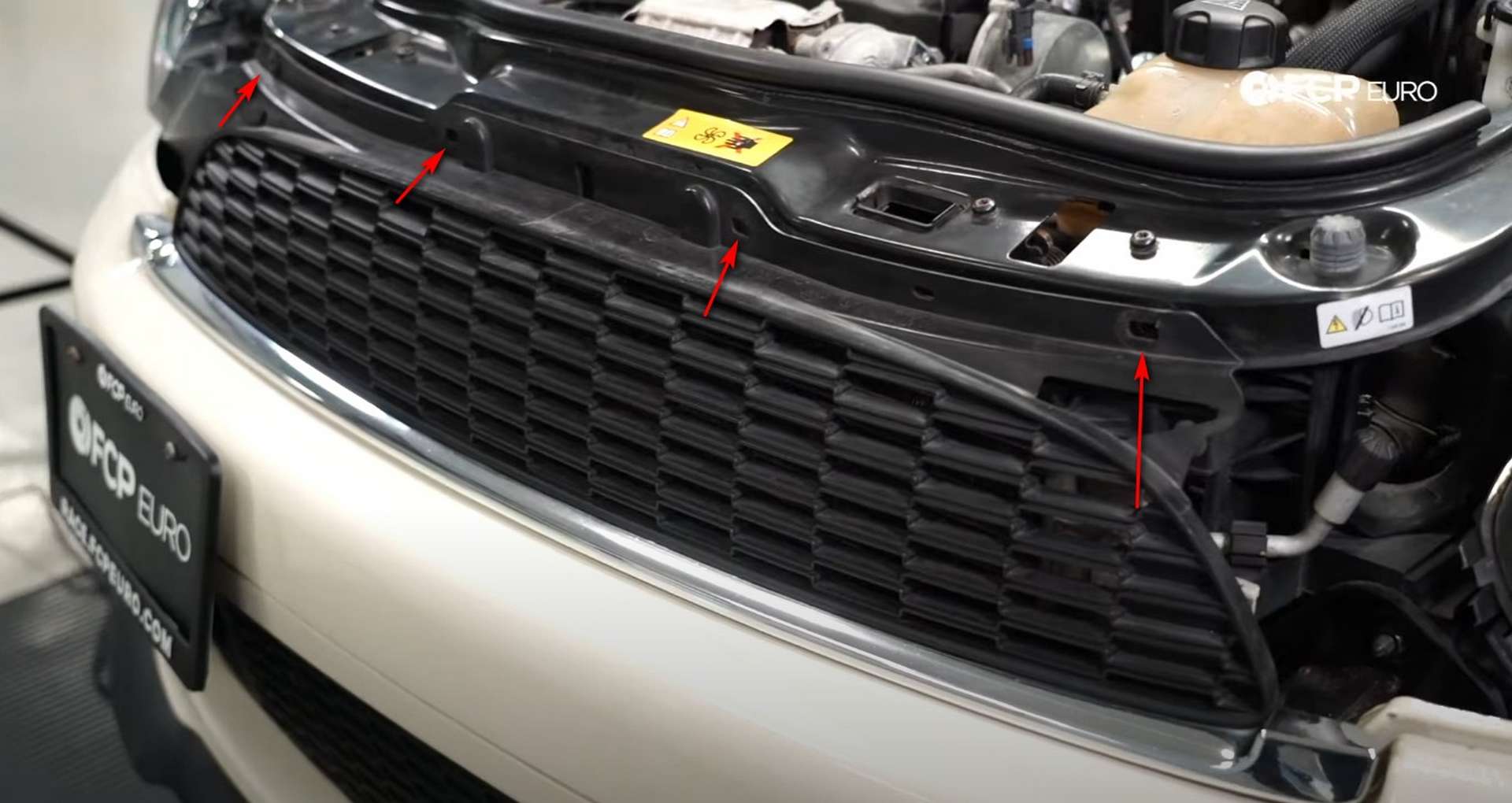 DIY MINI R56 Timing Chain Replacement removing the grill’s mounting clips