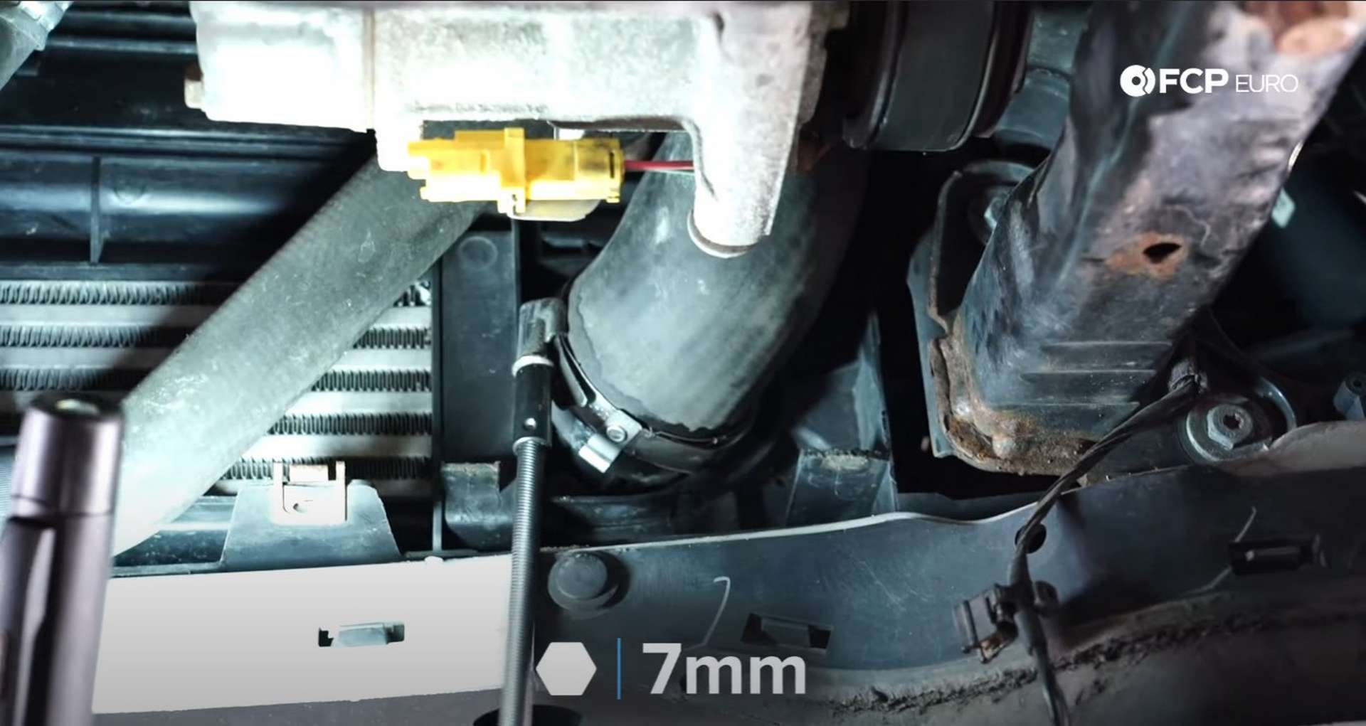 DIY MINI R56 Timing Chain Replacement refitting the charge pipe to the intercooler