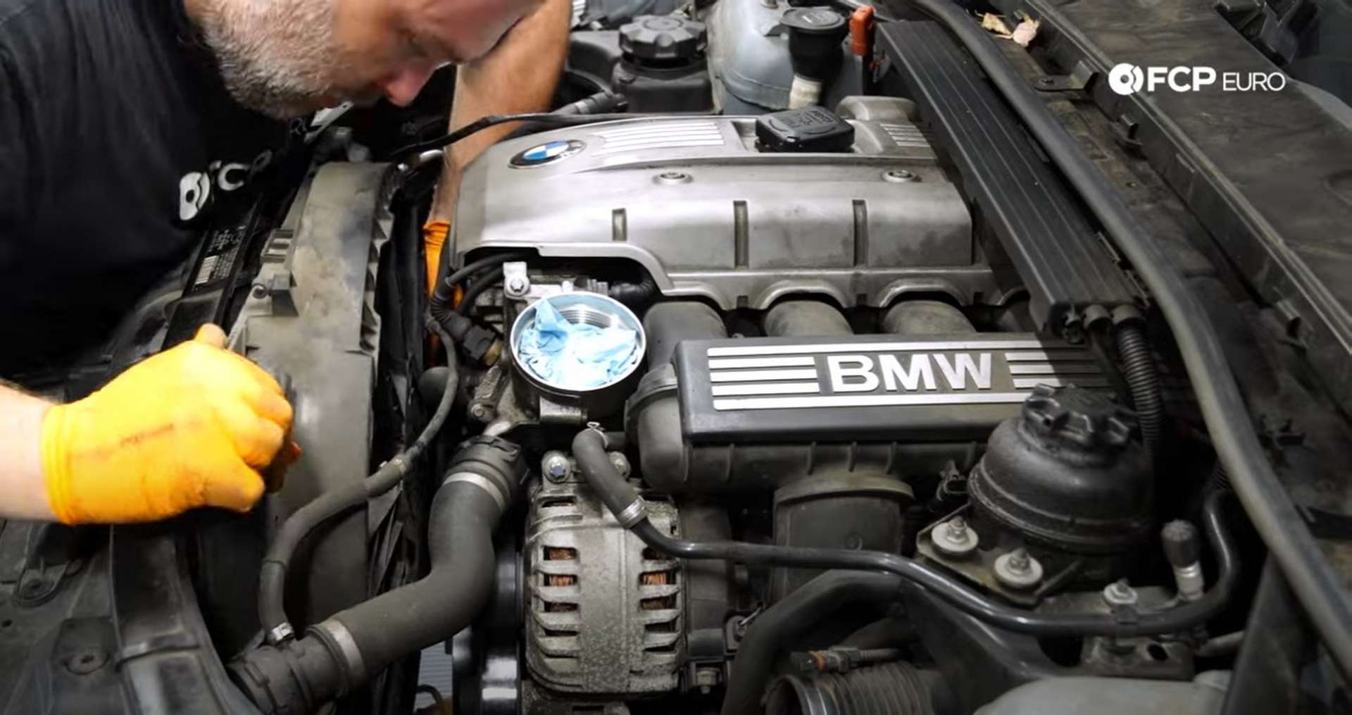 DIY BMW N52 Drive Belt Replacement removing the fan shroud