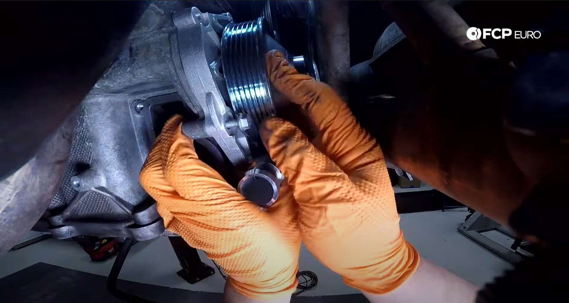 DIY Porsche 996 911 Water Pump And Thermostat Replacement installing the new water pump