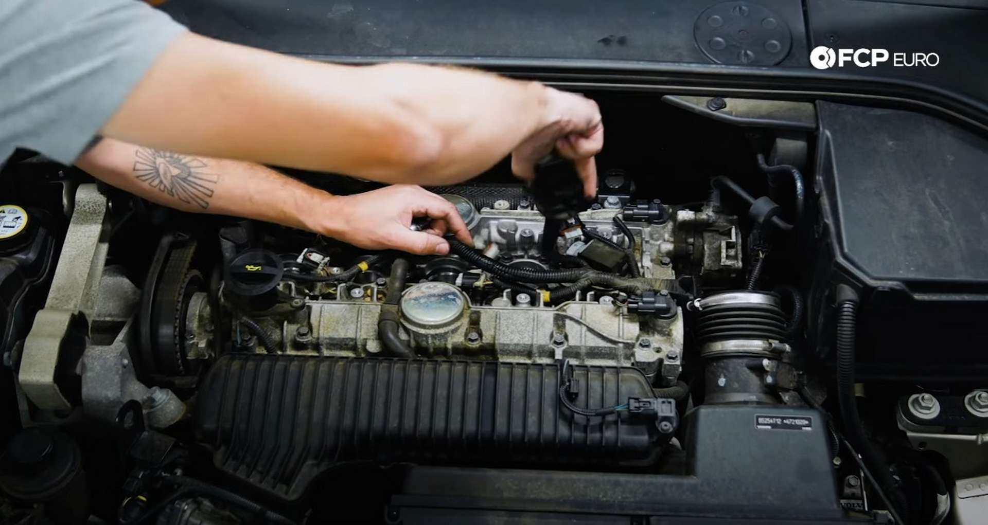 DIY Volvo Spark Plug and Ignition Coil Replacement removing the ignition coils