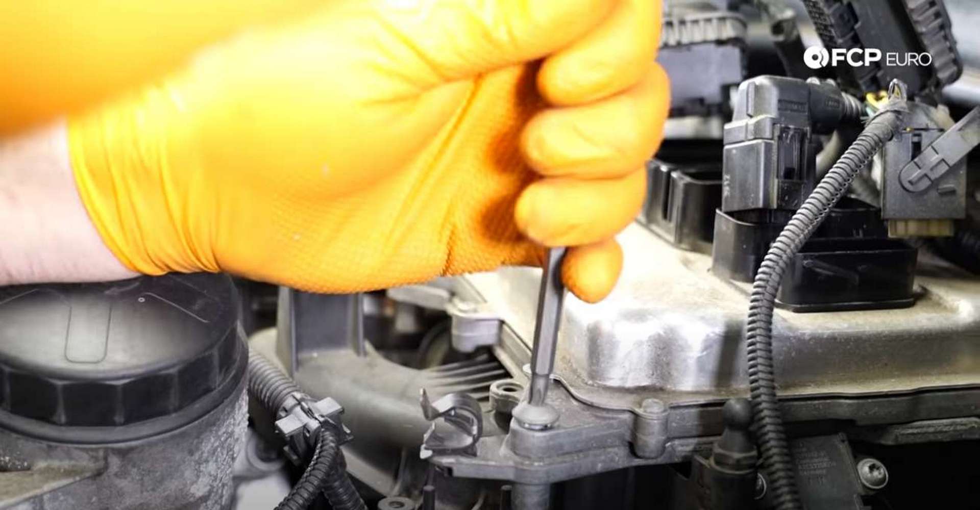 DIY BMW F30 Oil Filter Housing Gasket Replacement unbolting the DME