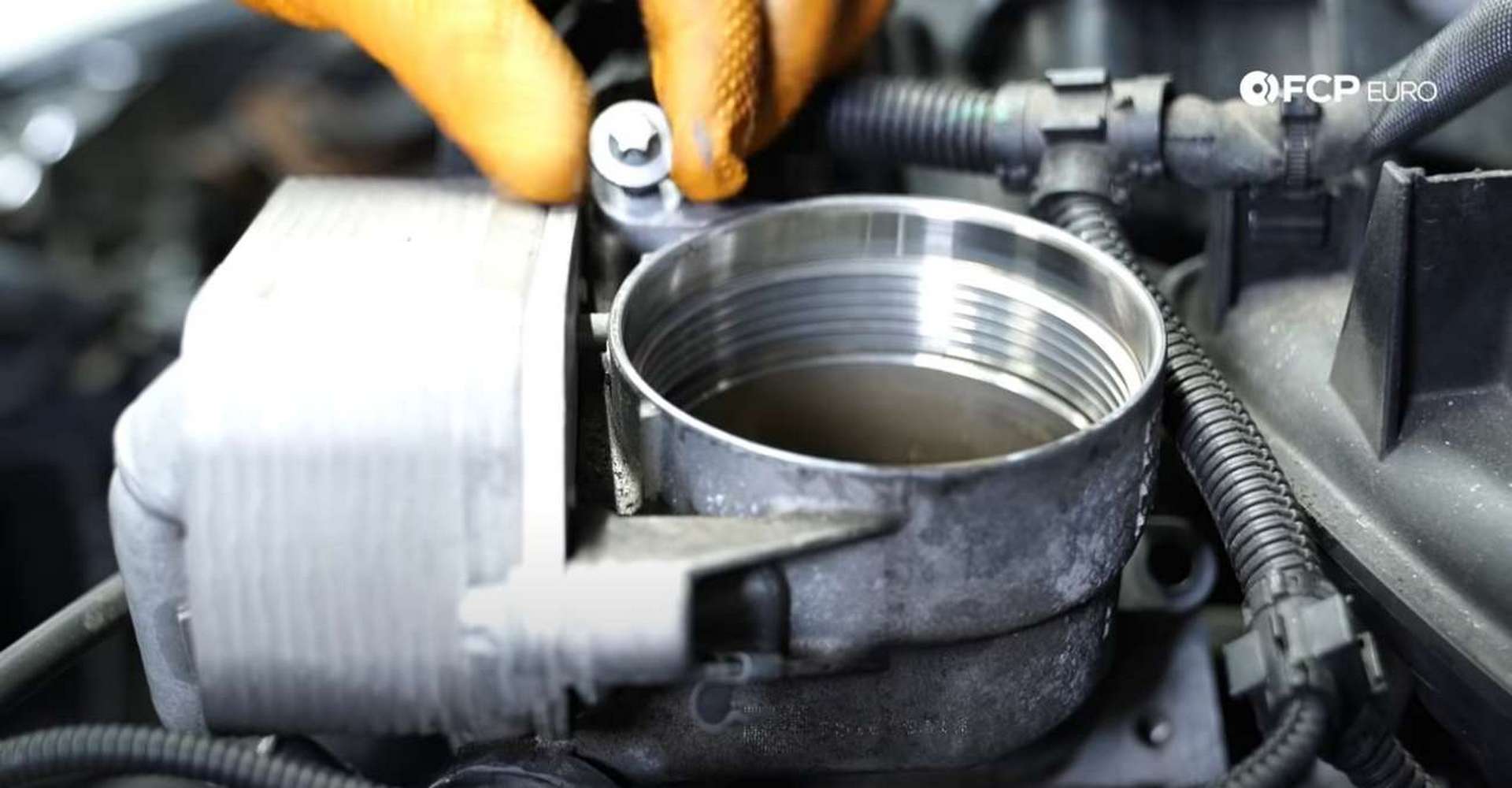 DIY BMW F30 Oil Filter Housing Gasket Replacement remaining oil filter housing bolt location