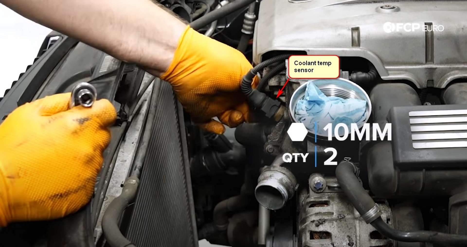 DIY BMW E9X Oil Filter Gasket Replacement removing the coolant flange and locating the coolant temp sensor