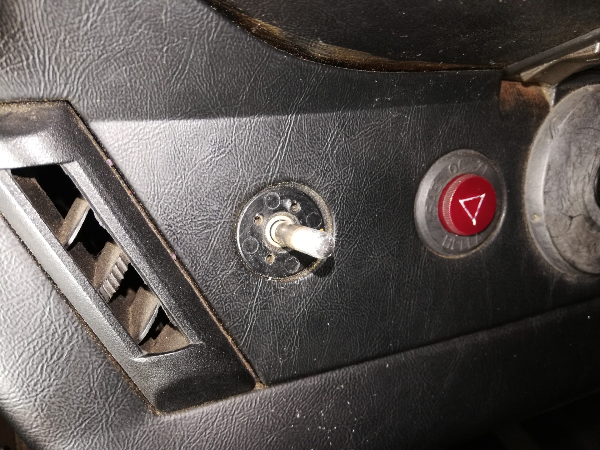 Air-cooled Porsche 911 headlight switch removal.