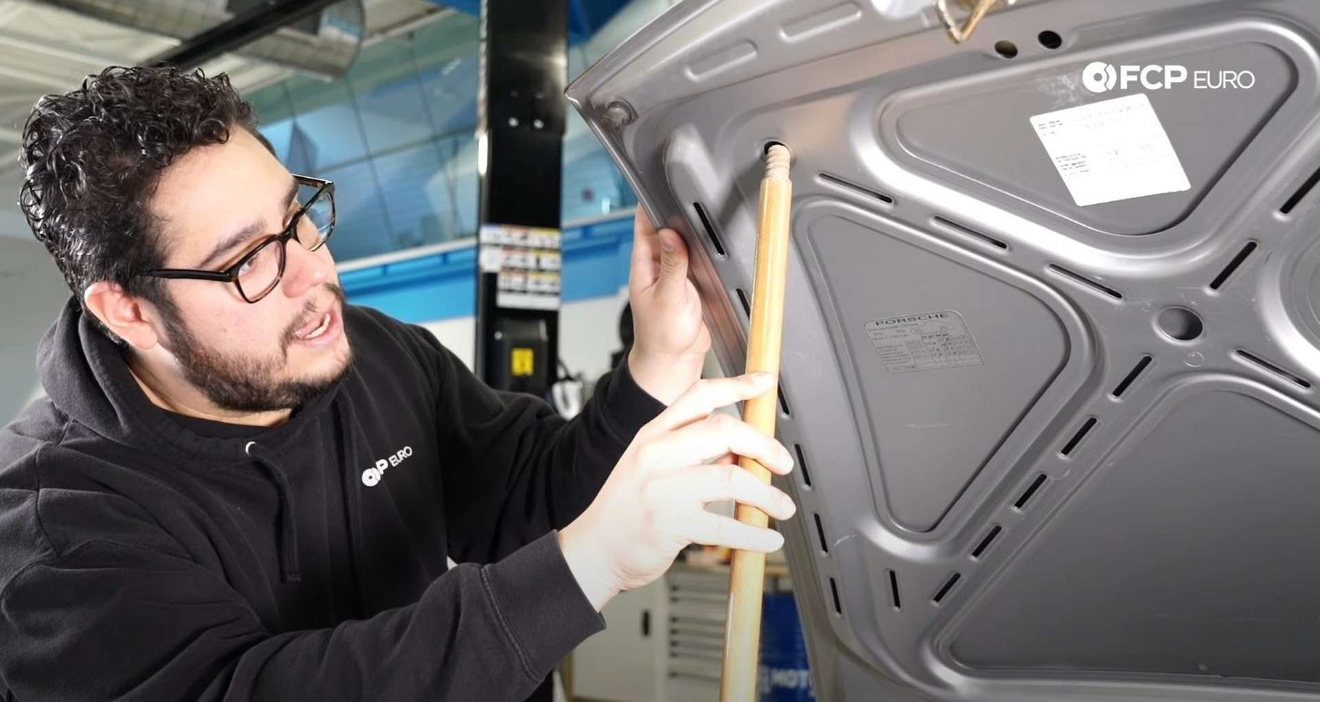 DIY Porsche 996 911 Hood and Engine Lid Strut Replacement propping up the hood
