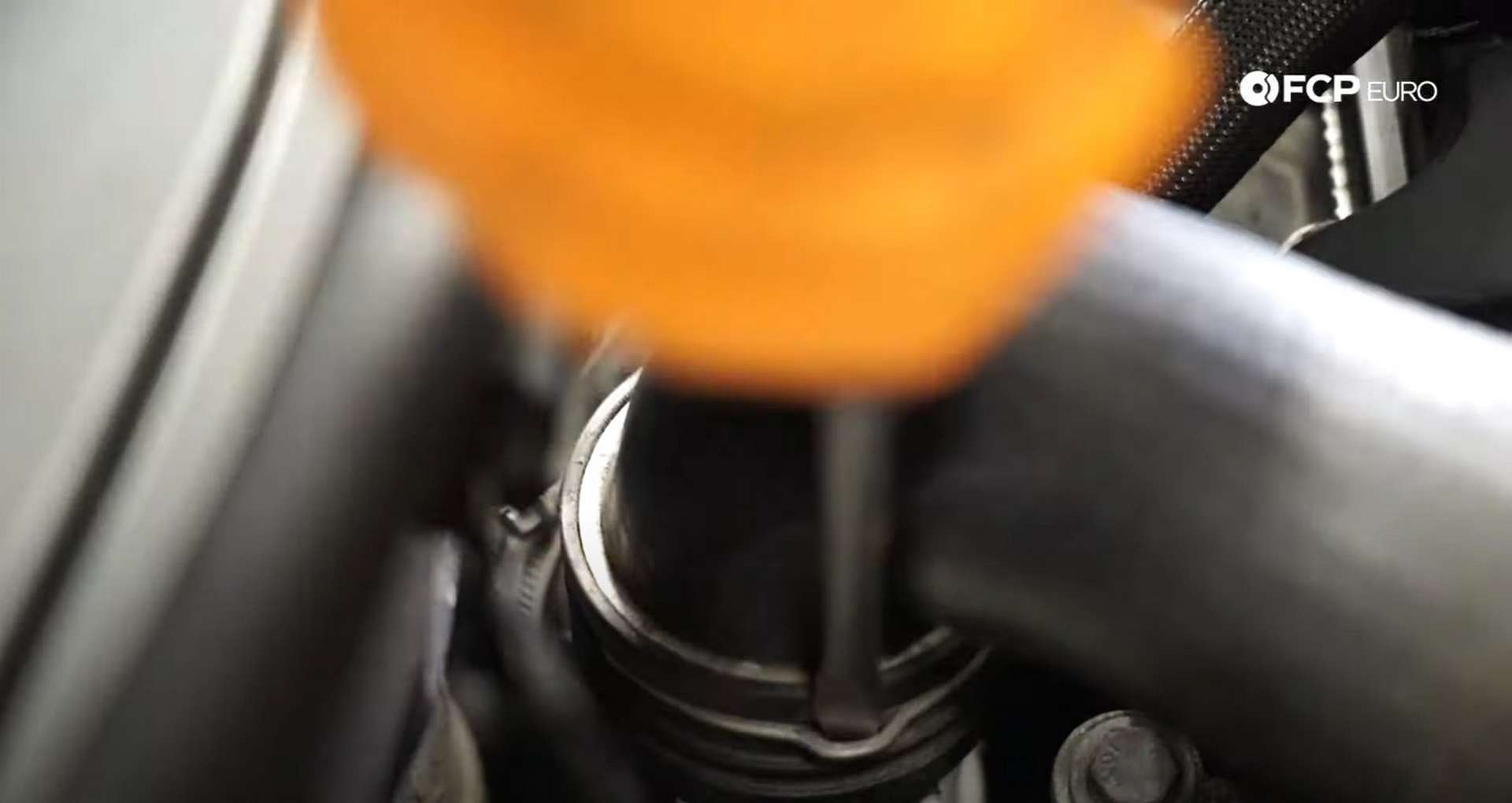DIY MINI R56 Timing Chain Replacement disconnecting the charge pipe from the throttle body