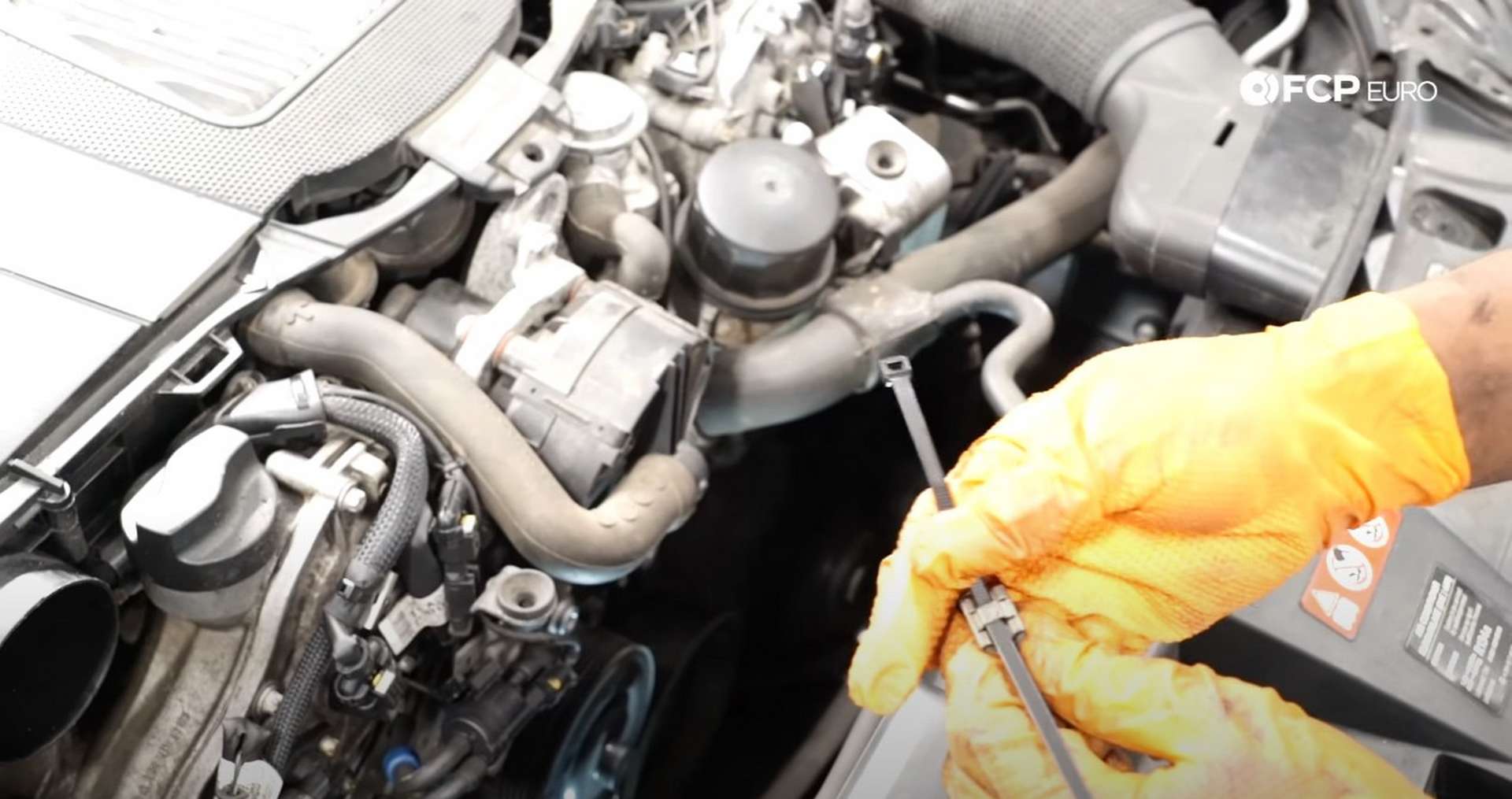 DIY Mercedes W212/204 Alternator and Drive Belt Replacement zip-tie through the spring clip