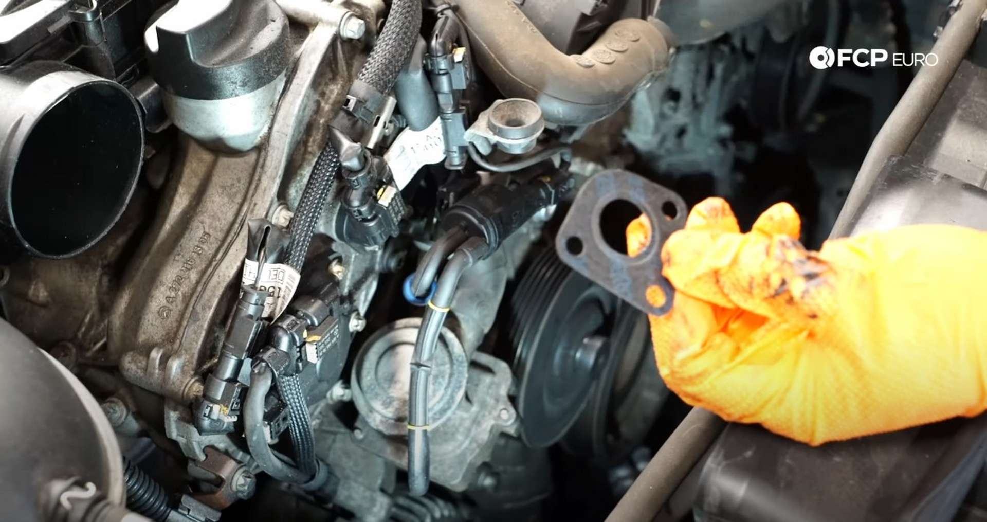 DIY Mercedes W212/204 Alternator and Drive Belt Replacement showing the positioning of the combi valve bolts