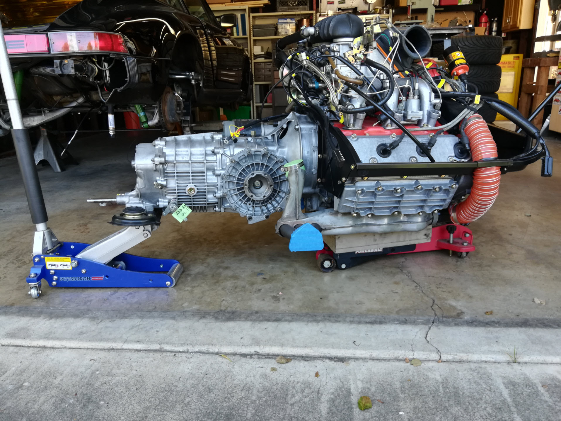 Air-cooled Porsche 911 engine and gearbox out of the car.