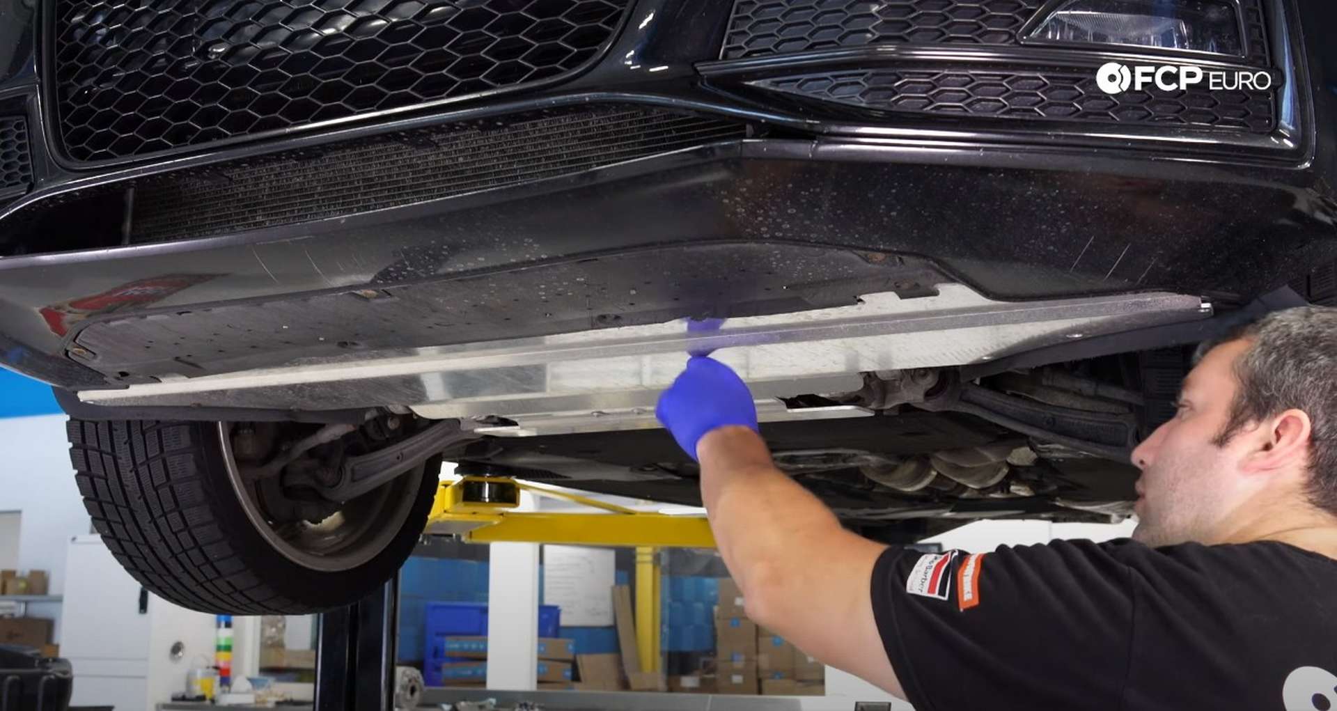 DIY Audi B8.5 Water Pump and Thermostat Replacement removing the undertray
