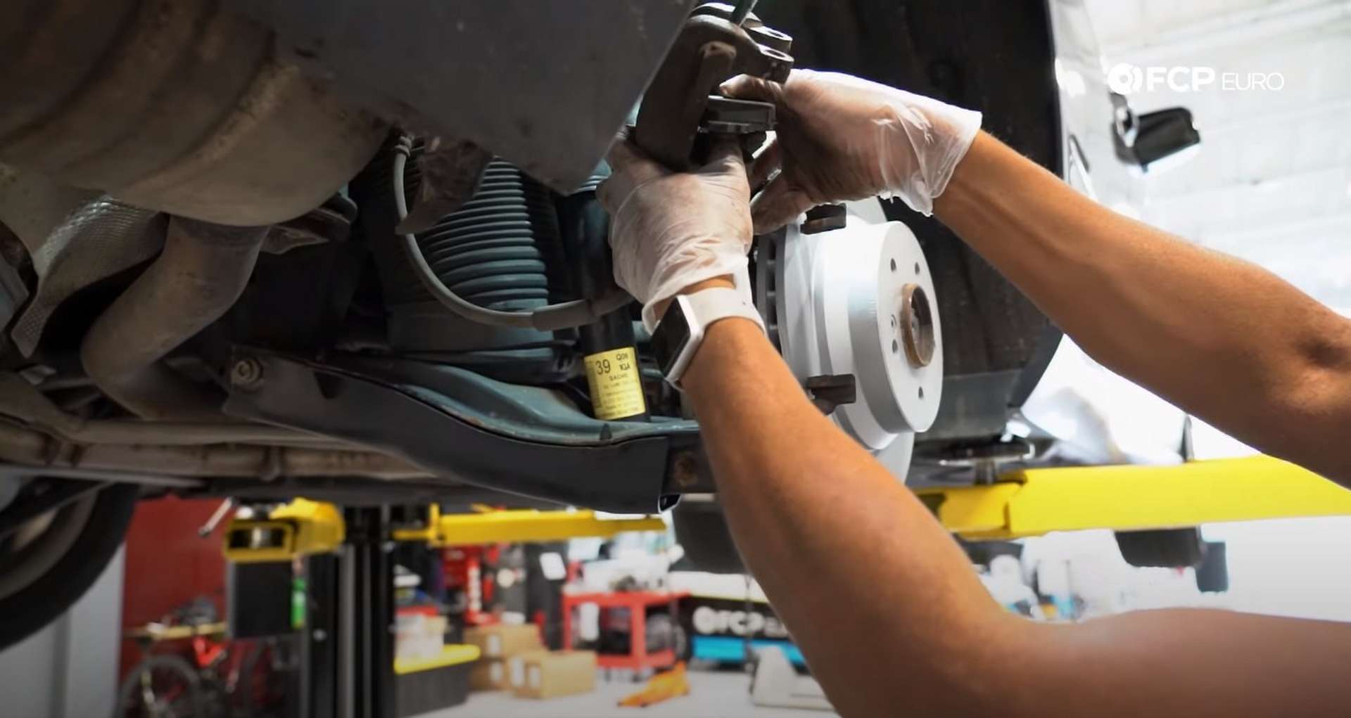 DIY Mercedes W211/212 Rear Brake Job installing the inner pad into the caliper