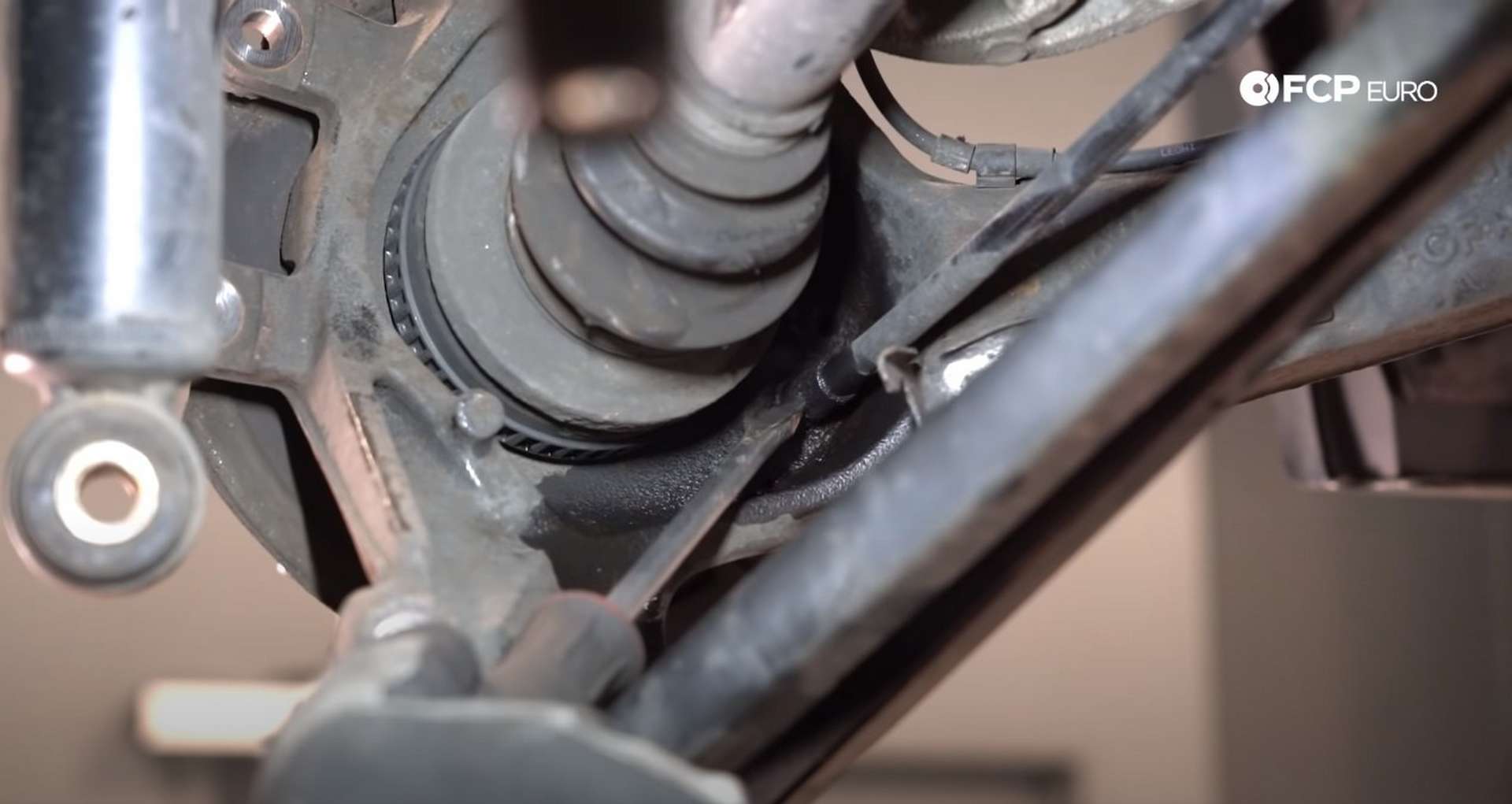 DIY E46 BMW M3 Rear Subframe Refresh Part 1 wiggling out the parking brake cable