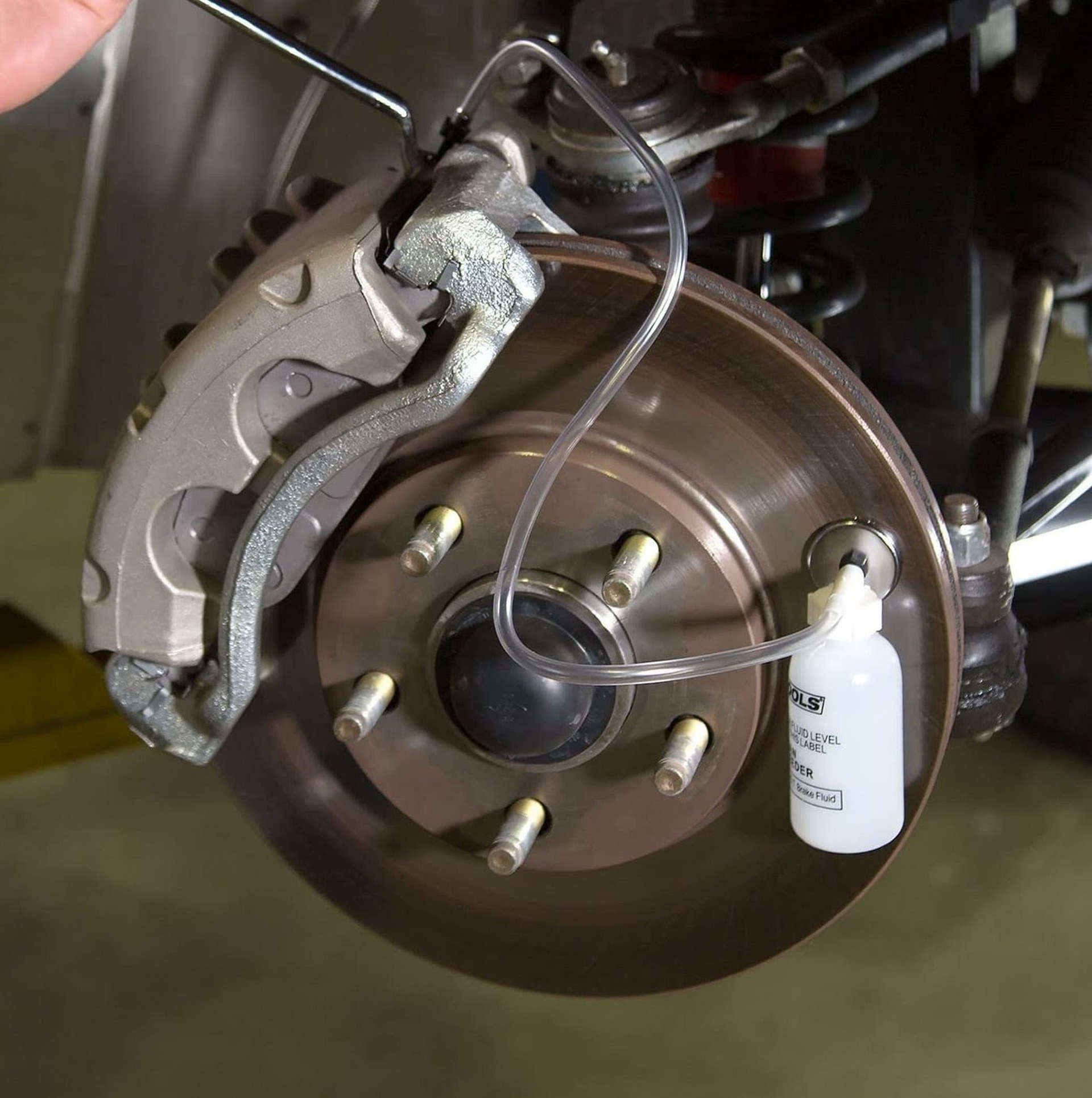 how-to-bleed-your-brakes-motive-catch-bottle