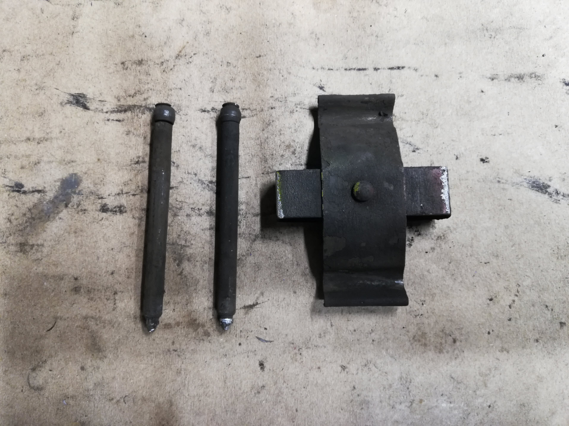 Air-cooled Porsche 911 brake pad retaining hardware.