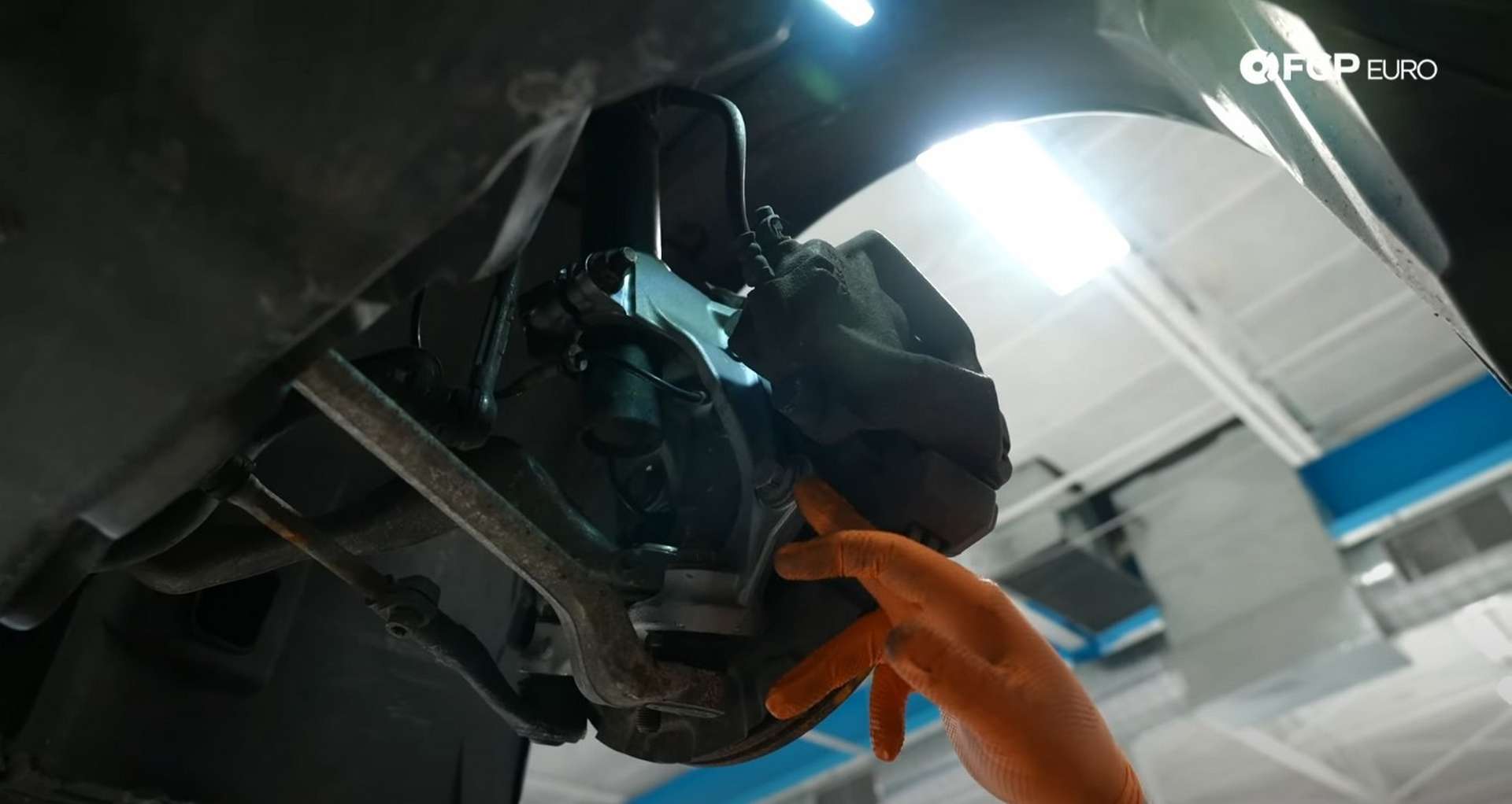 DIY BMW E90 Steering Knuckle Replacement caliper mounting bolt location