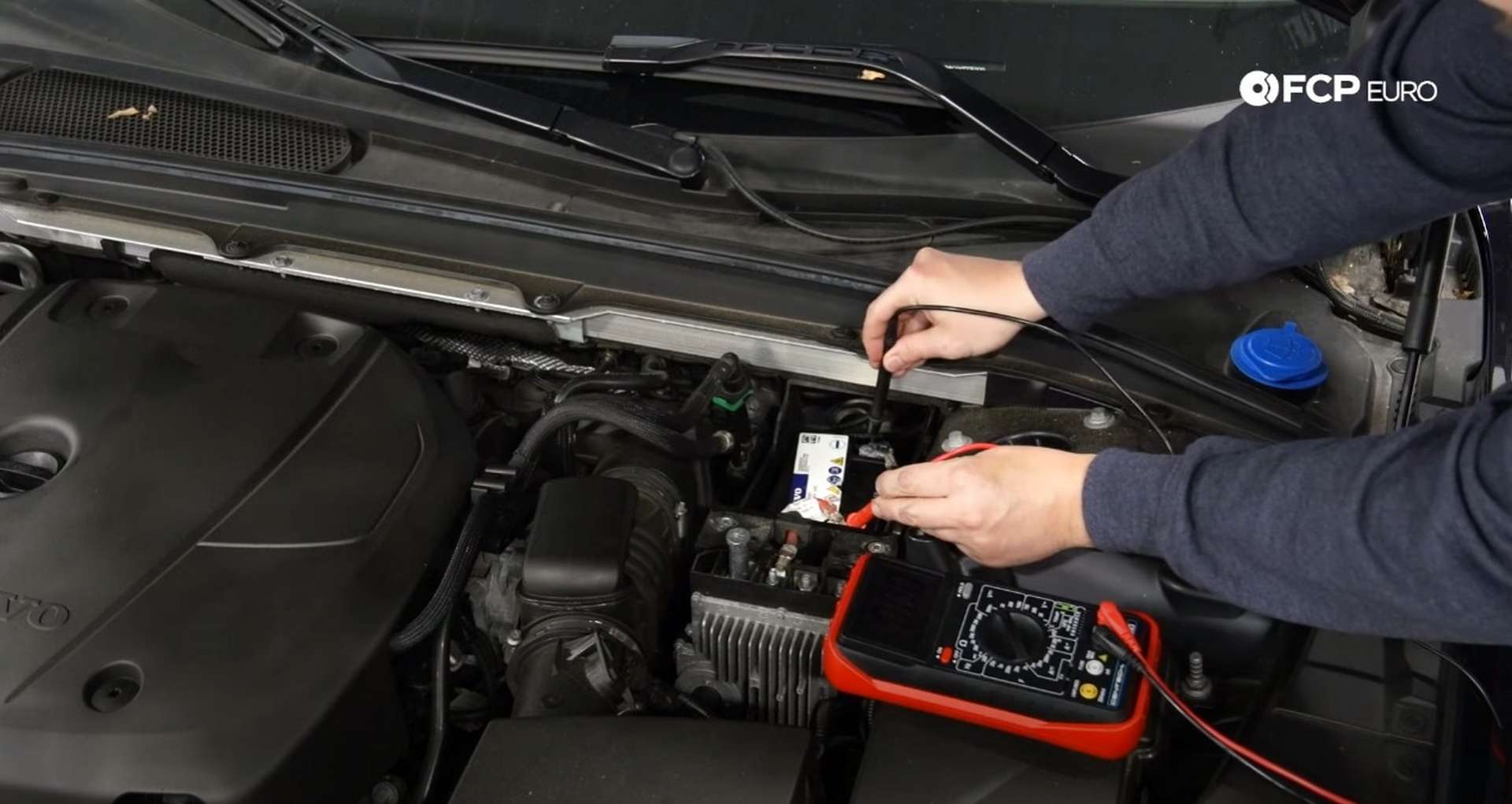 DIY Volvo SPA auxiliary Battery Check and Replacement testing the battery