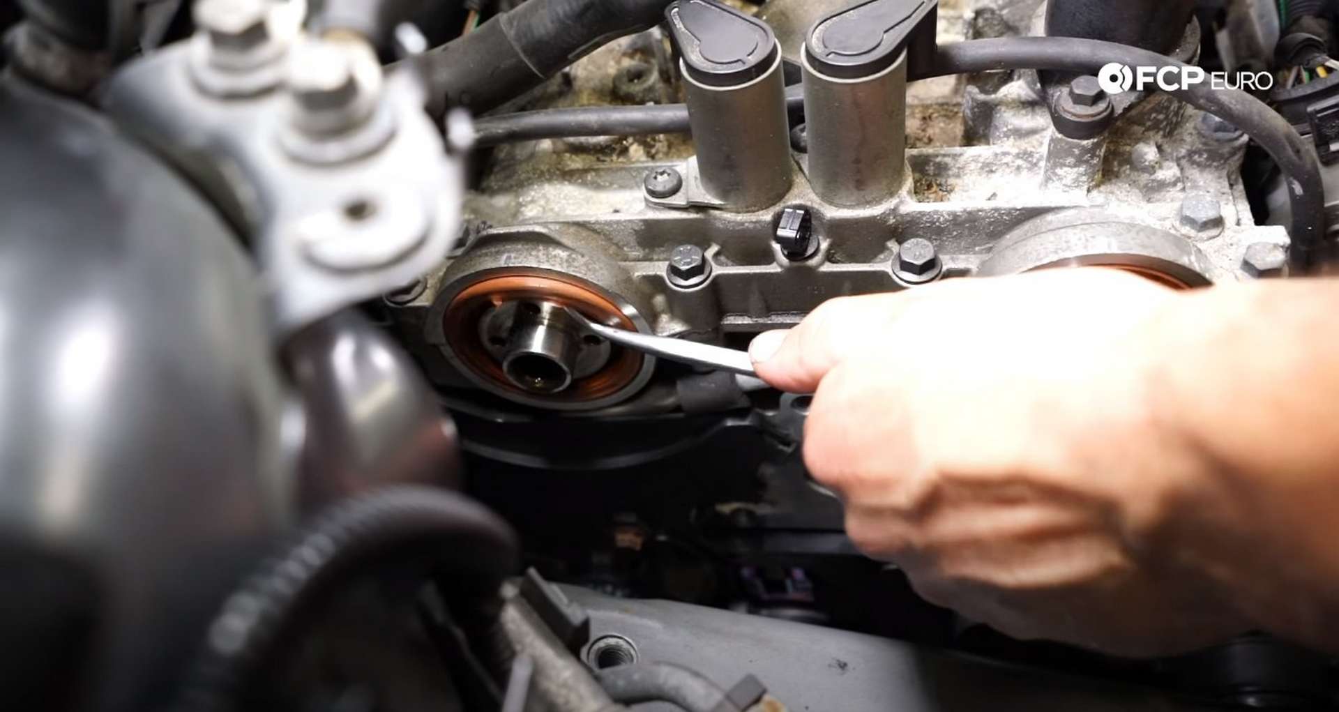 DIY Volvo P1 Timing Belt Replacement installing the new timing belt tensioner