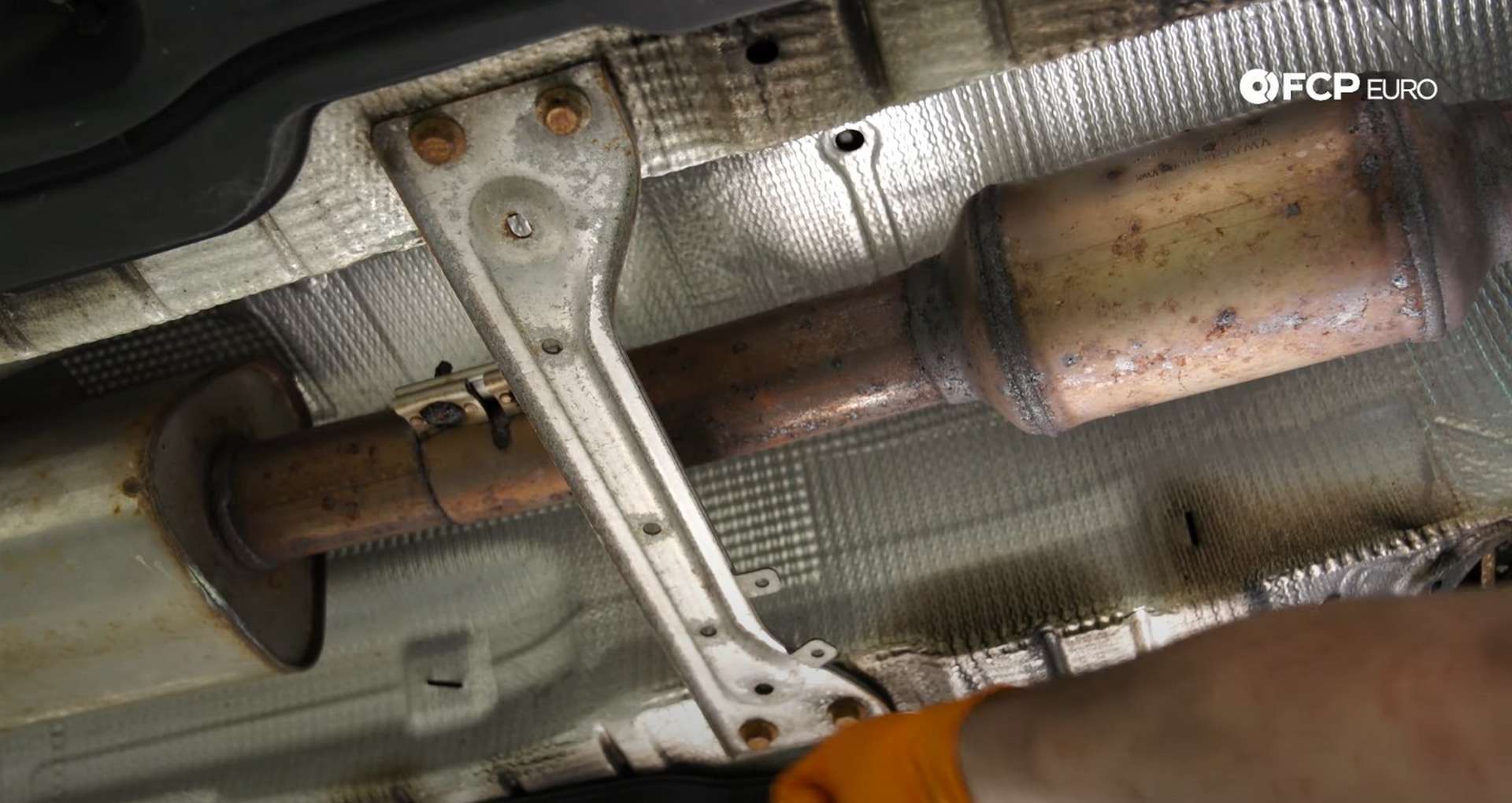 DIY MK7 VW GTI Turbocharger Upgrade chassis brace covering exhaust
