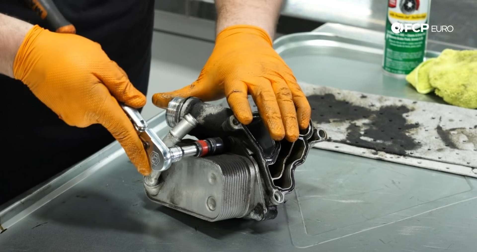 DIY BMW F30 Oil Filter Housing Gasket Replacement removing the oil cooler bolts