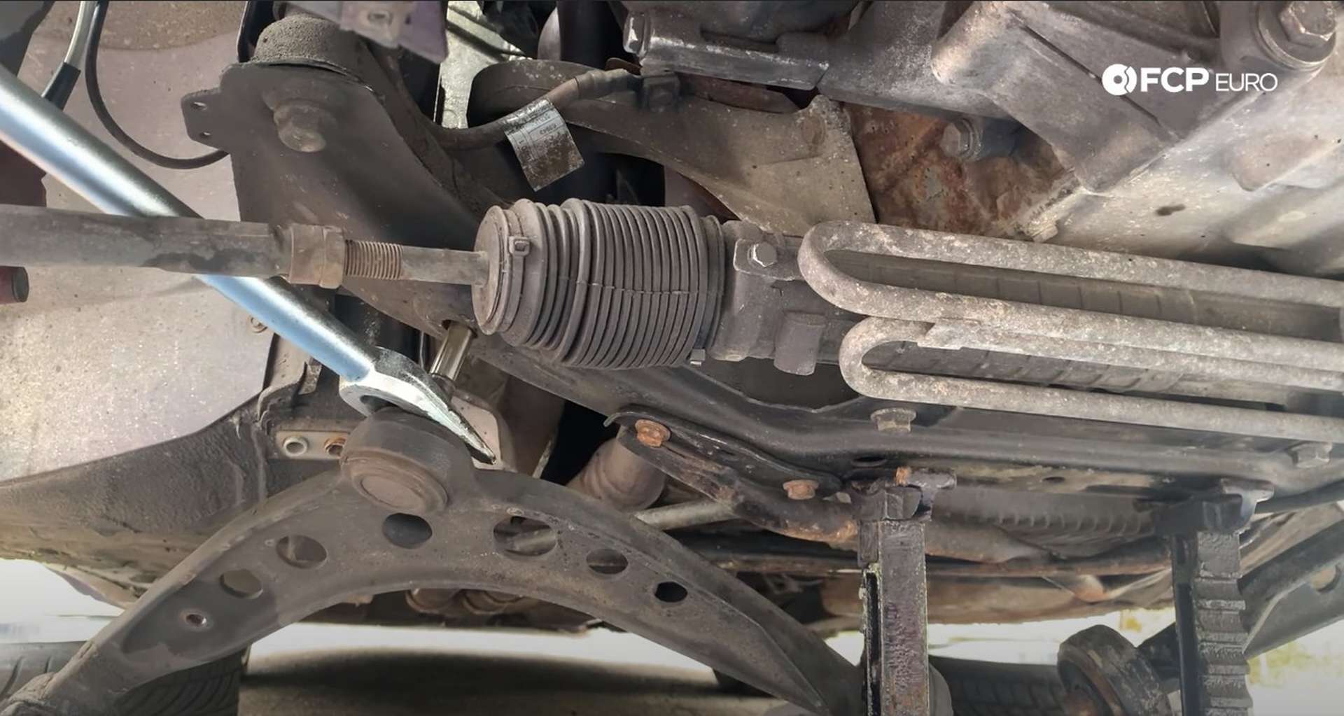 DIY BMW E36 Control Arm and Bushings separating the inner ball joint from the subframe