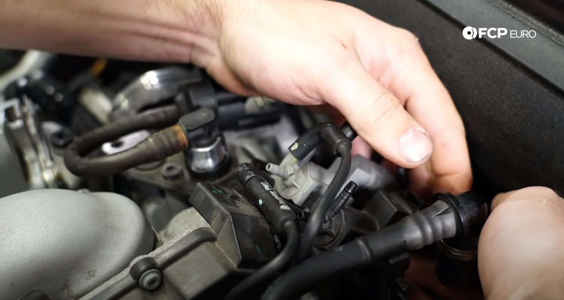 DIY Audi 3.0T PCV/AOS Replacement installing the coolant line mounting bolt