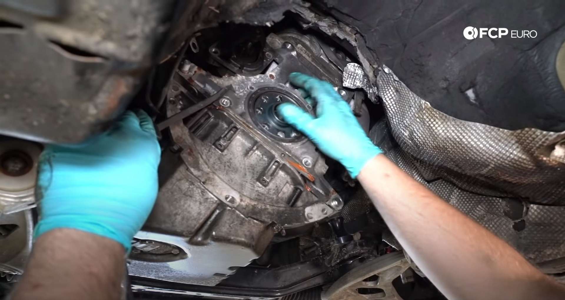 DIY BMW E46 Clutch Replacement removing the rear main seal housing