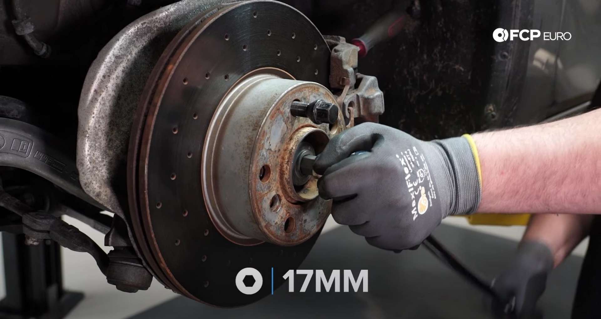 DIY BMW F30 Front Wheel Bearing Replacement removing the axle bolt