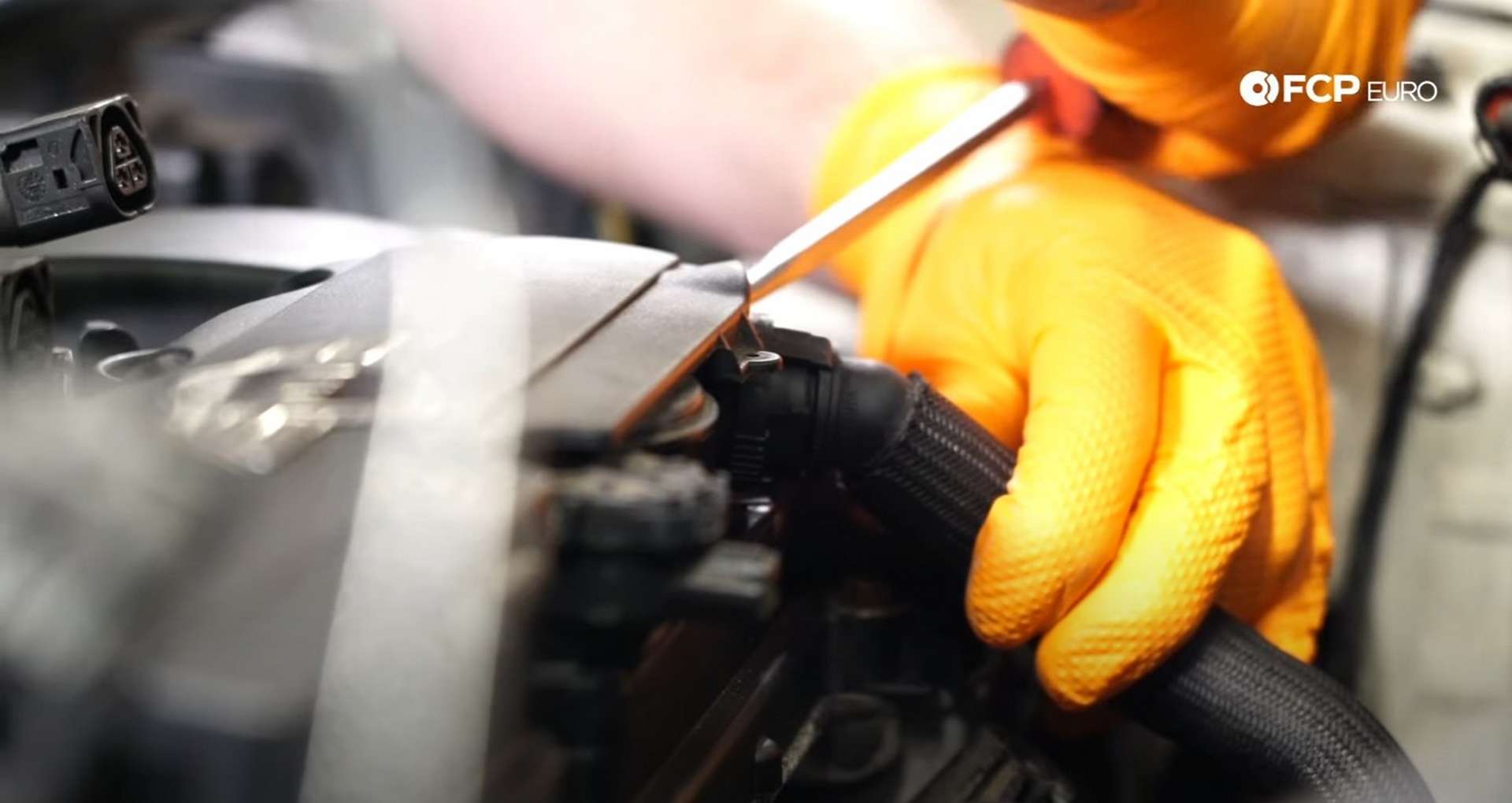 DIY MINI R56 Timing Chain Replacement disconnecting the crankcase breather hose