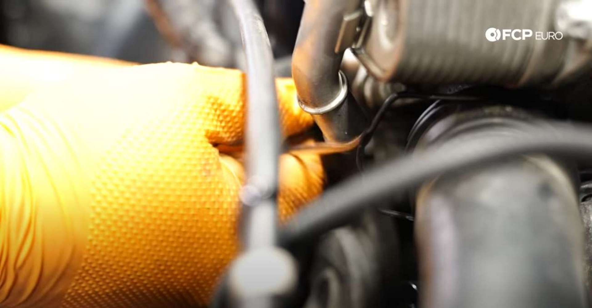 DIY BMW F30 Oil Filter Housing Gasket Replacement unlocking coolant line