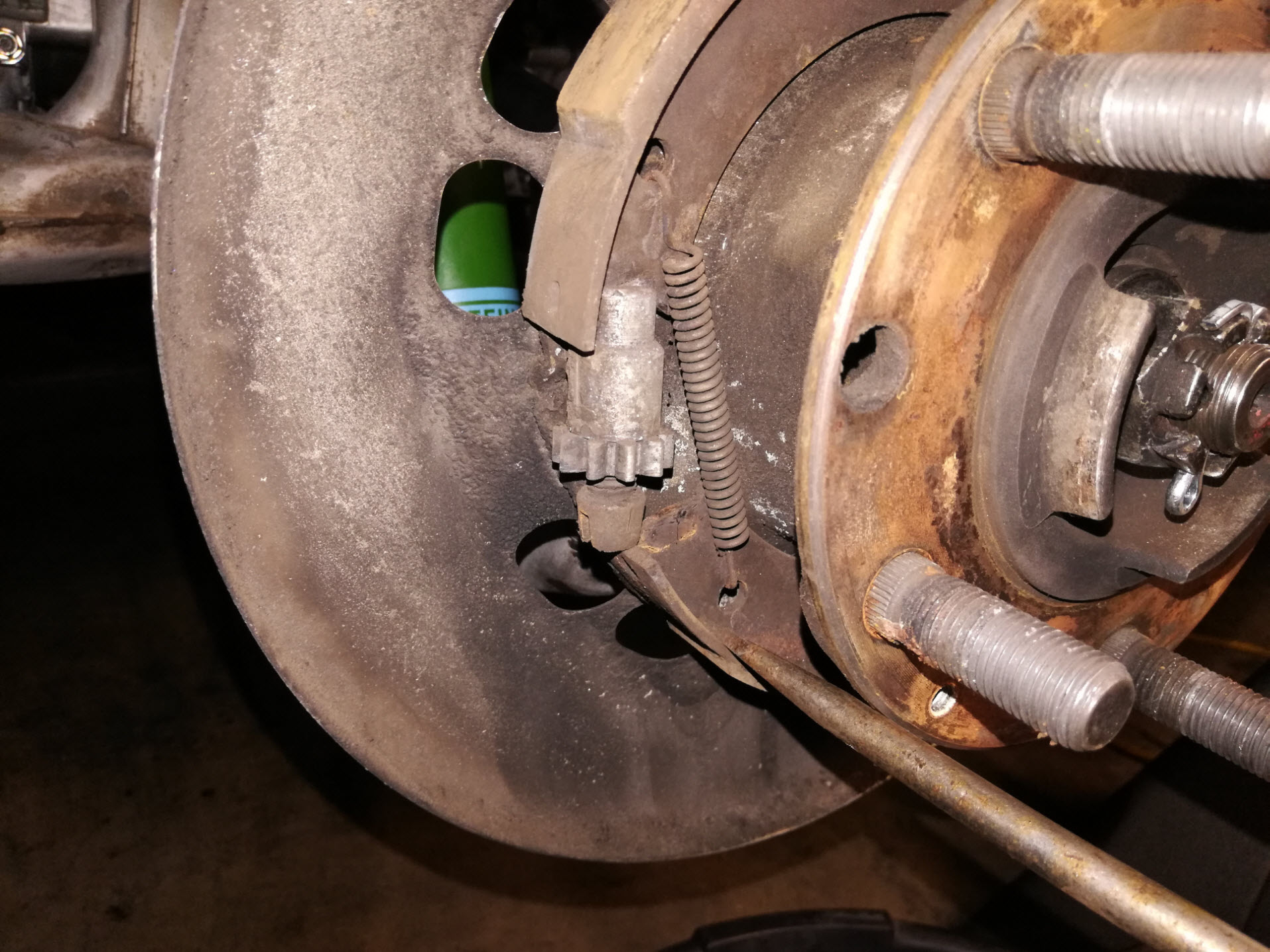 Air-cooled Porsche 911 parking brake adjuster removal.