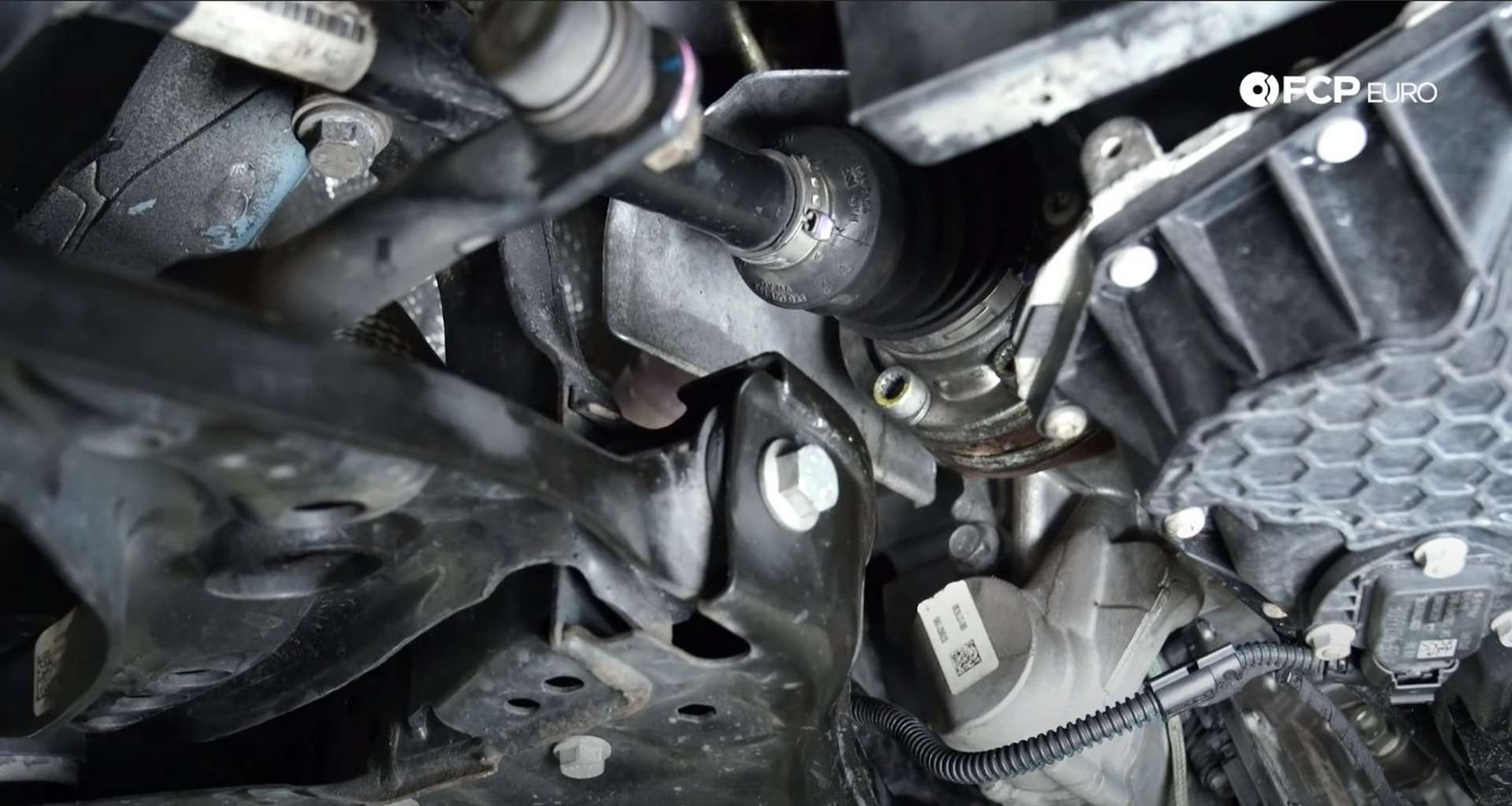 68-DIY_VW_GTI_Clutch-Job-Reinstalling-Axle-Heat-Shield