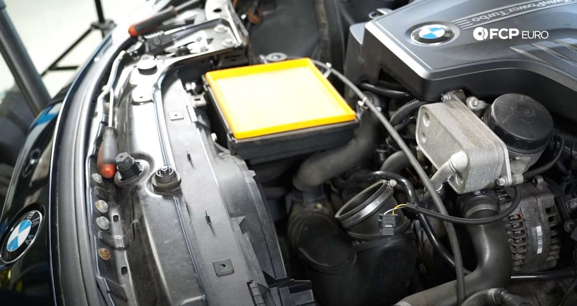 DIY BMW F30 Air Filter Replacement airbox cover removed