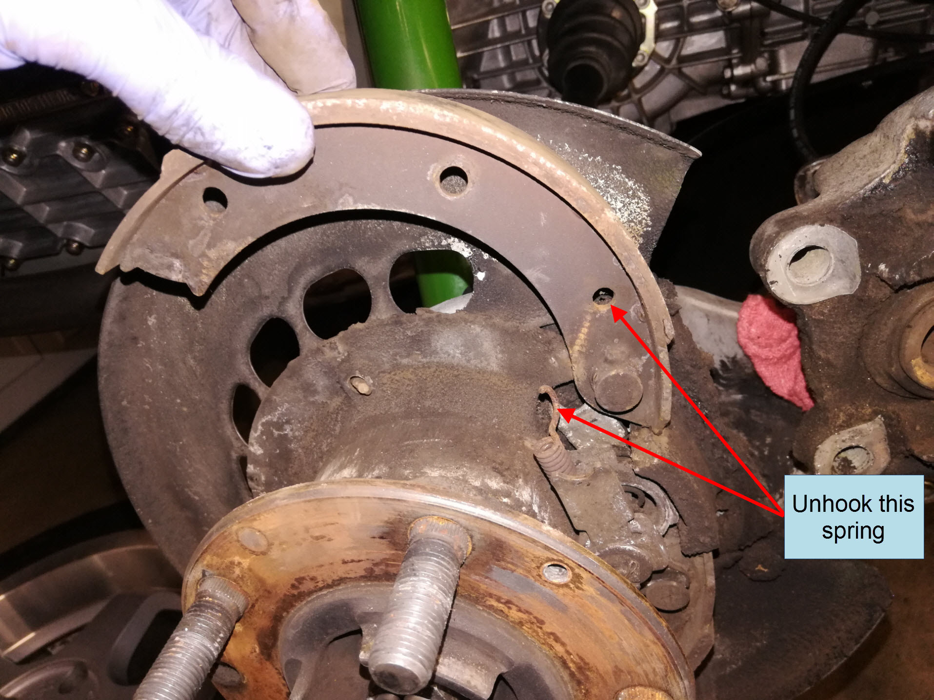 Air-cooled Porsche 911 parking brake shoe removal.