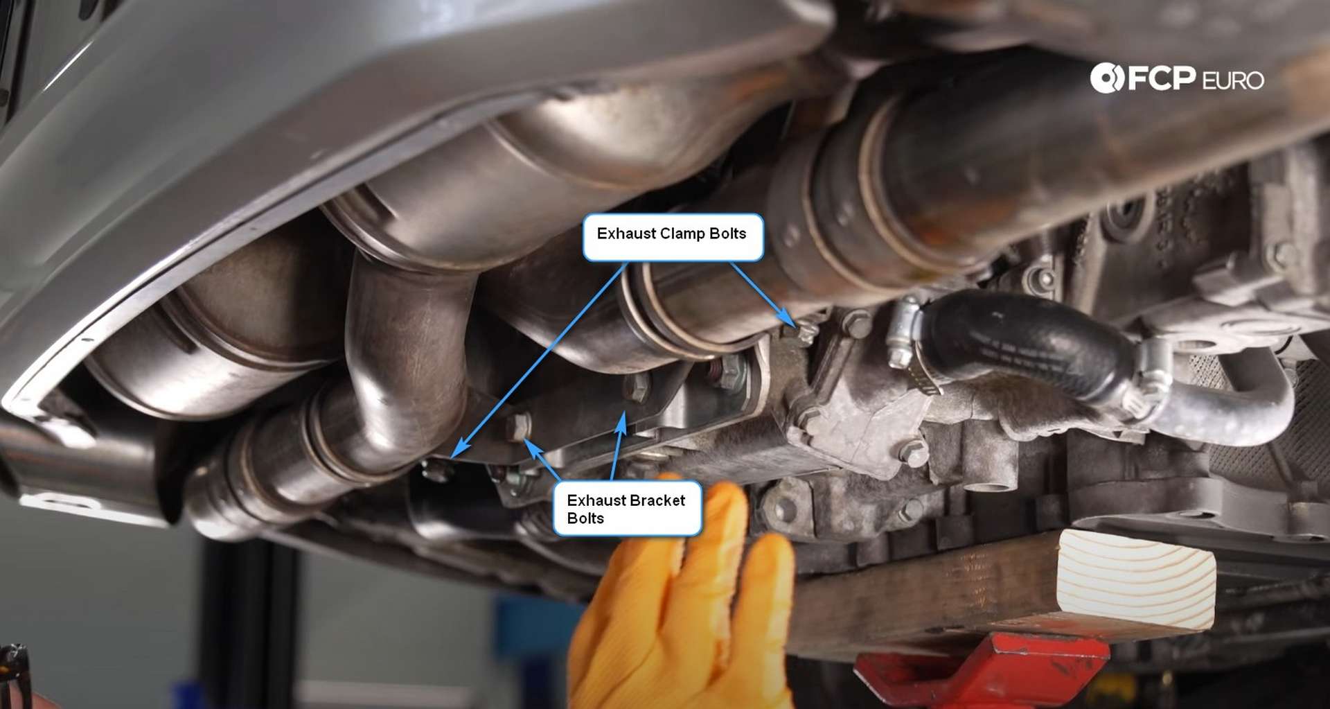 DIY Porsche 996 911 Water Pump And Thermostat Replacement exhaust clamp locations
