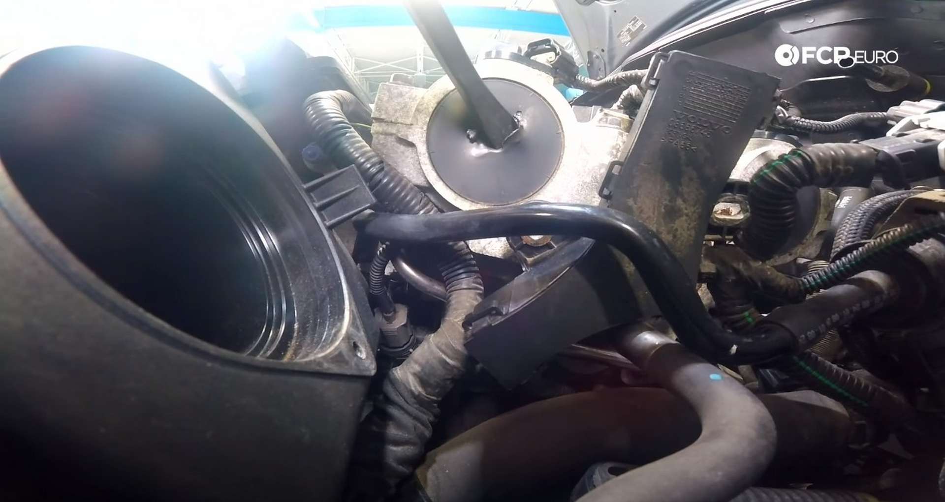 DIY Volvo P1 Water Pump Replacement chiseling through the camshaft covers